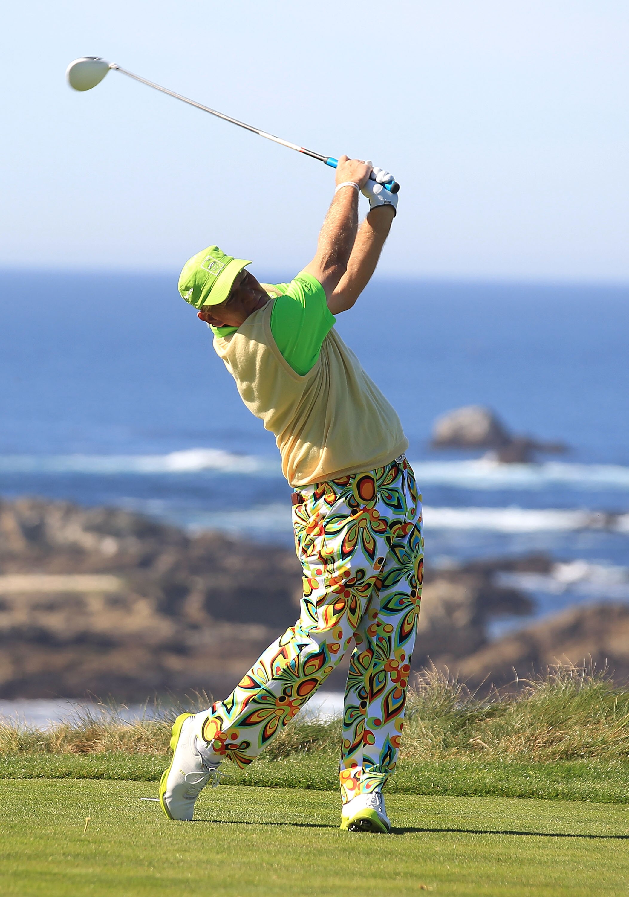 PEBBLE BEACH, CA - FEBRUARY 11:  John Daly hits from the third tee box at the AT&T Pebble Beach National Pro-Am- Round Two at the Spyglass golf club on February 11, 2011 in Pebble Beach, California.  (Photo by Jed Jacobsohn/Getty Images)
