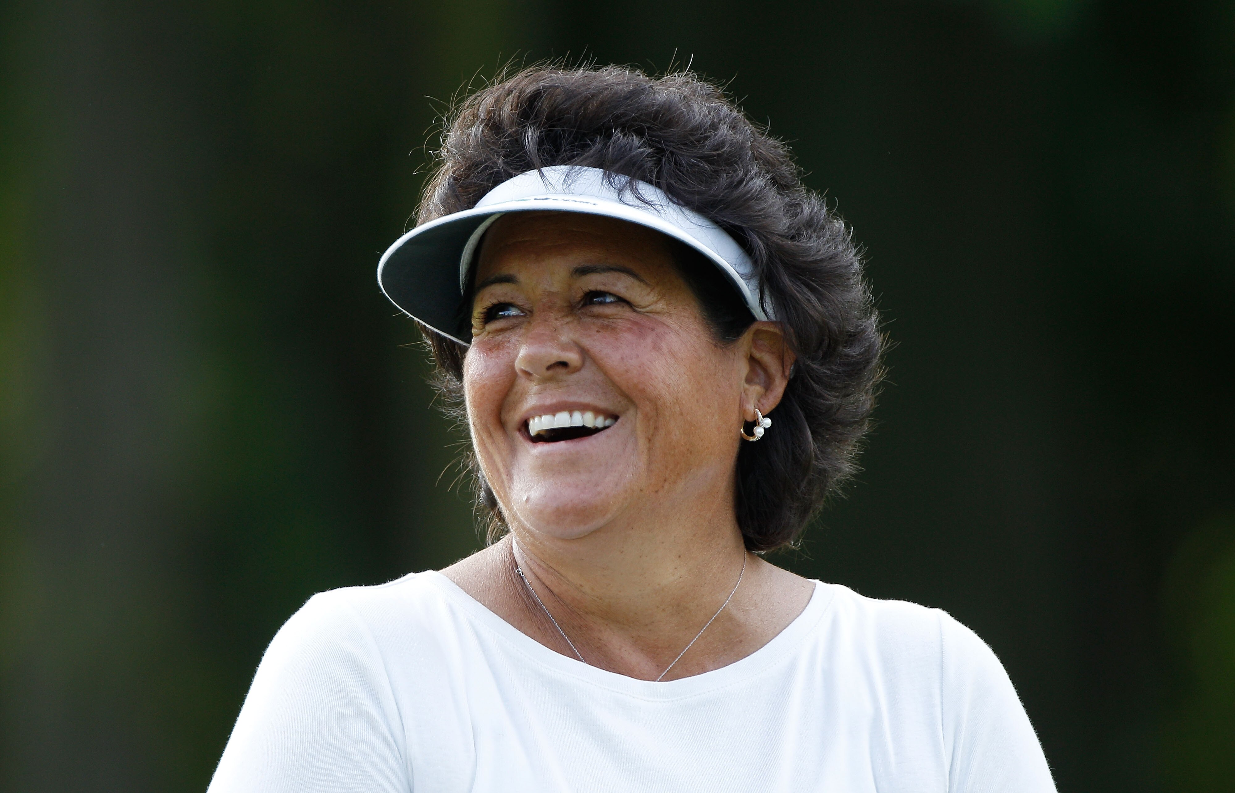 PITTSFORD, NY - JUNE 23:  Nancy Lopez smiles as she walks off a green during a practice round prior to the start of the LPGA Championship presented by Wegman's 2010 at the Locust Hill Country Club on June 23, 2010 in Pittsford, New York  (Photo by Scott H