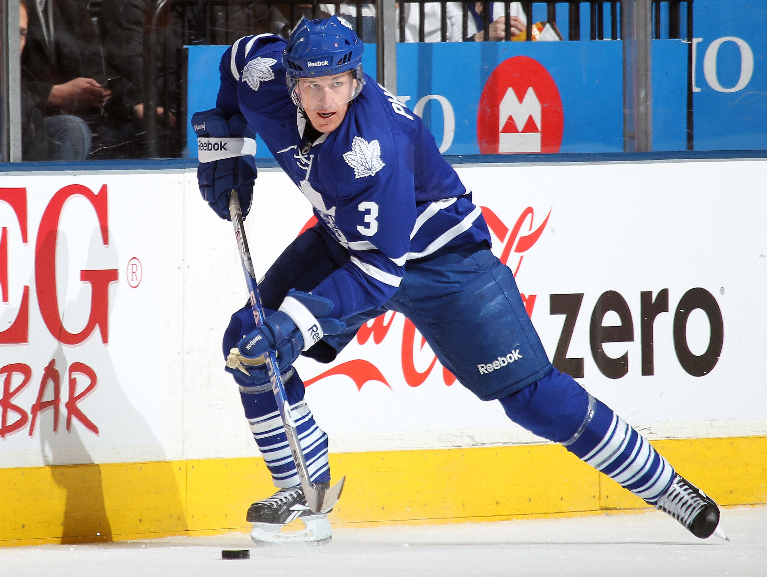 TORONTO, CAN - FEBRUARY 7:  Dion Phaneuf #3 of the Toronto Maple Leafs skates with the puck in a game against the Toronto Maple Leafs on February 7, 2011 at the Air Canada Centre in Toronto, Canada. The Leafs defeated the Thrashers 5-4. (Photo by Claus An