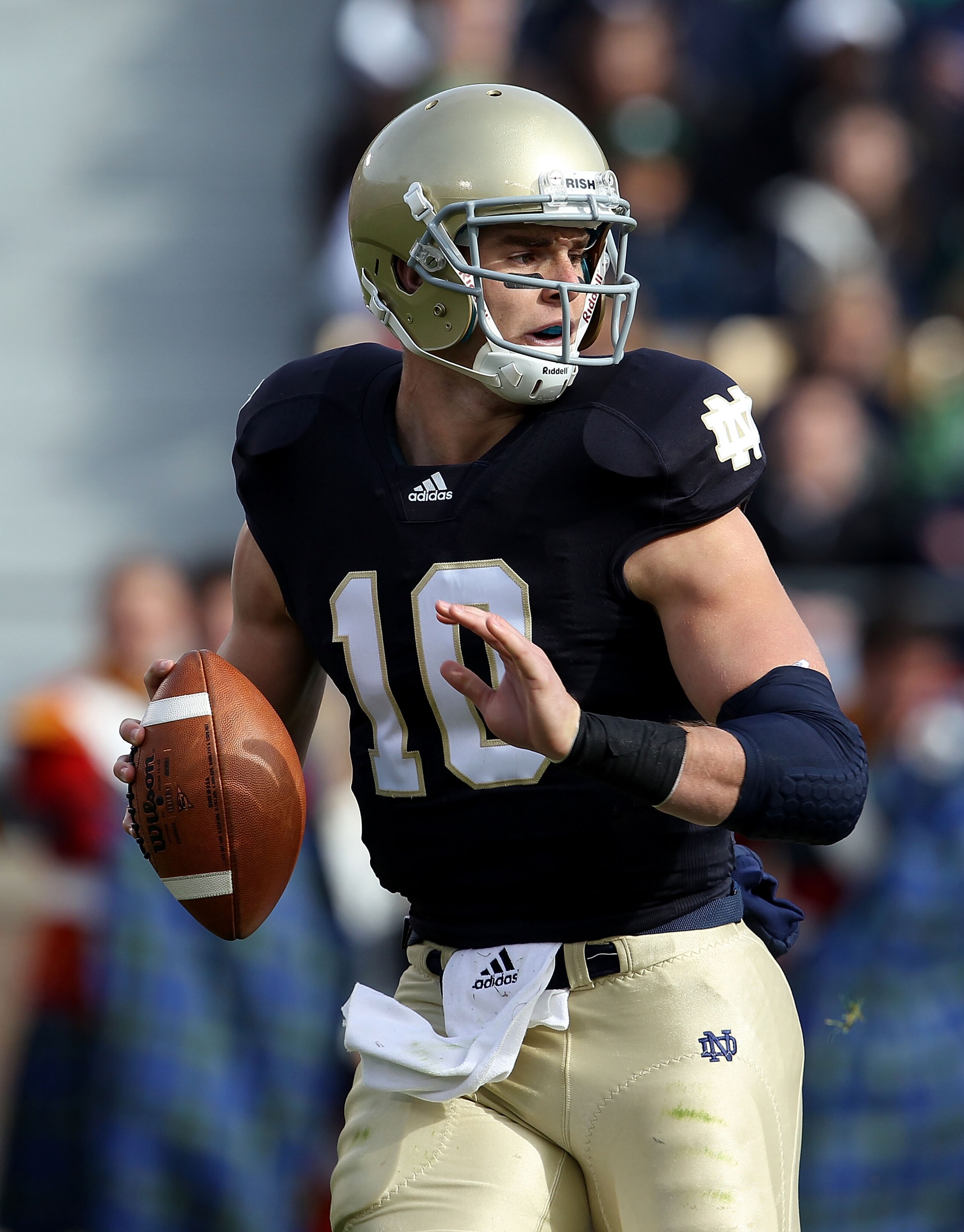 SOUTH BEND, IN - OCTOBER 30: Dayne Crist #10 of the Notre Dame Fighting Irish looks for a receiver against the Tulsa Golden Hurricane at Notre Dame Stadium on October 30, 2010 in South Bend, Indiana. Tulsa defeated Notre Dame 28-27. (Photo by Jonathan Dan SOUTH BEND, IN - OCTOBER 30: Dayne Crist #10 of the Notre Dame Fighting Irish looks for a receiver against the Tulsa Golden Hurricane at Notre Dame Stadium on October 30, 2010 in South Bend, Indiana. Tulsa defeated Notre Dame 28-27. (Photo by Jonathan Dan