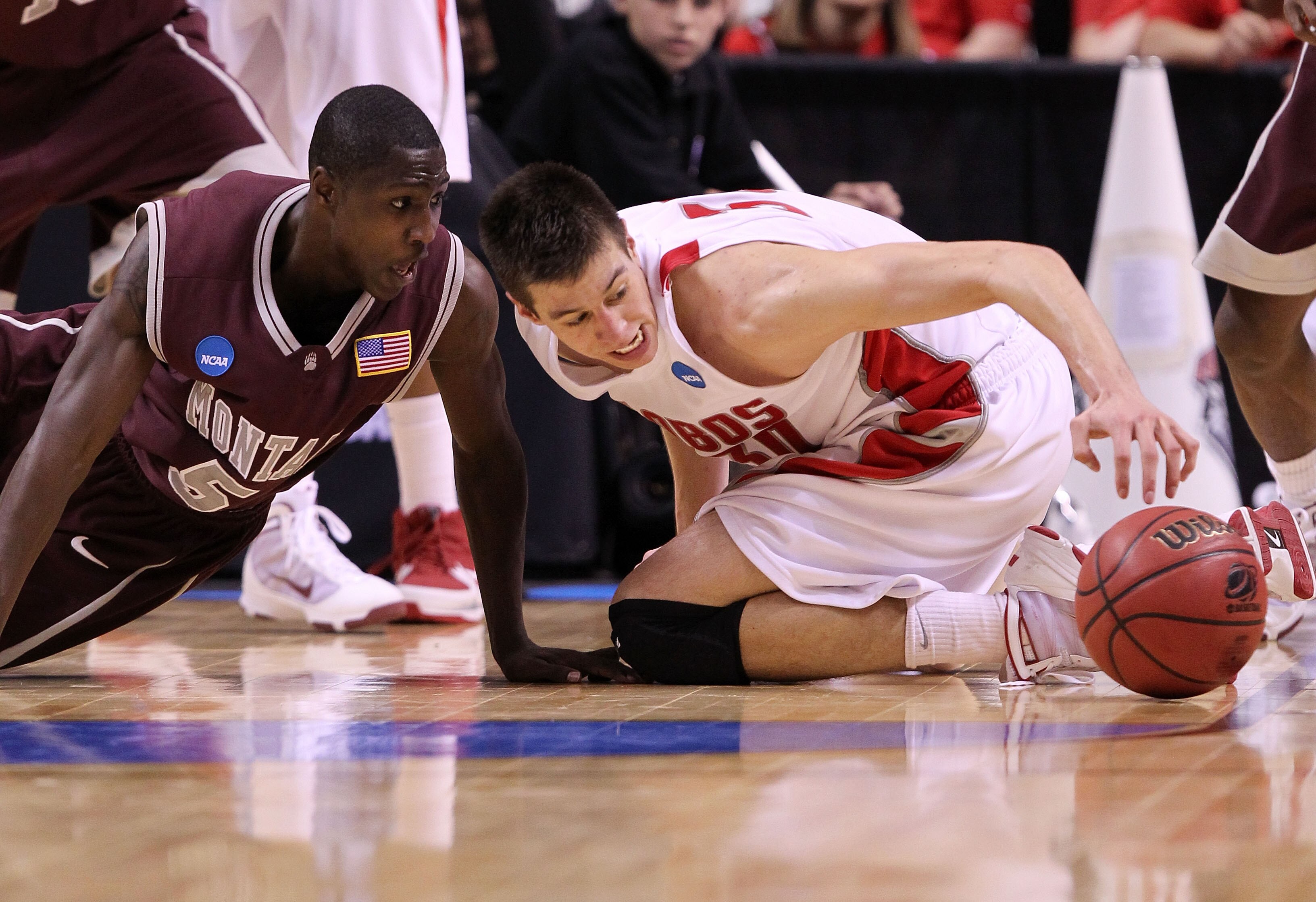 SAN JOSE, CA - MARCH 18:  Guard Will Cherry #5 of the Montana Grizzlies and forward Roman Martinez #30 of the New Mexico Lobos chase after a loose ball during the first round of the 2010 NCAA men's basketball tournament at HP Pavilion on March 18, 2010 in