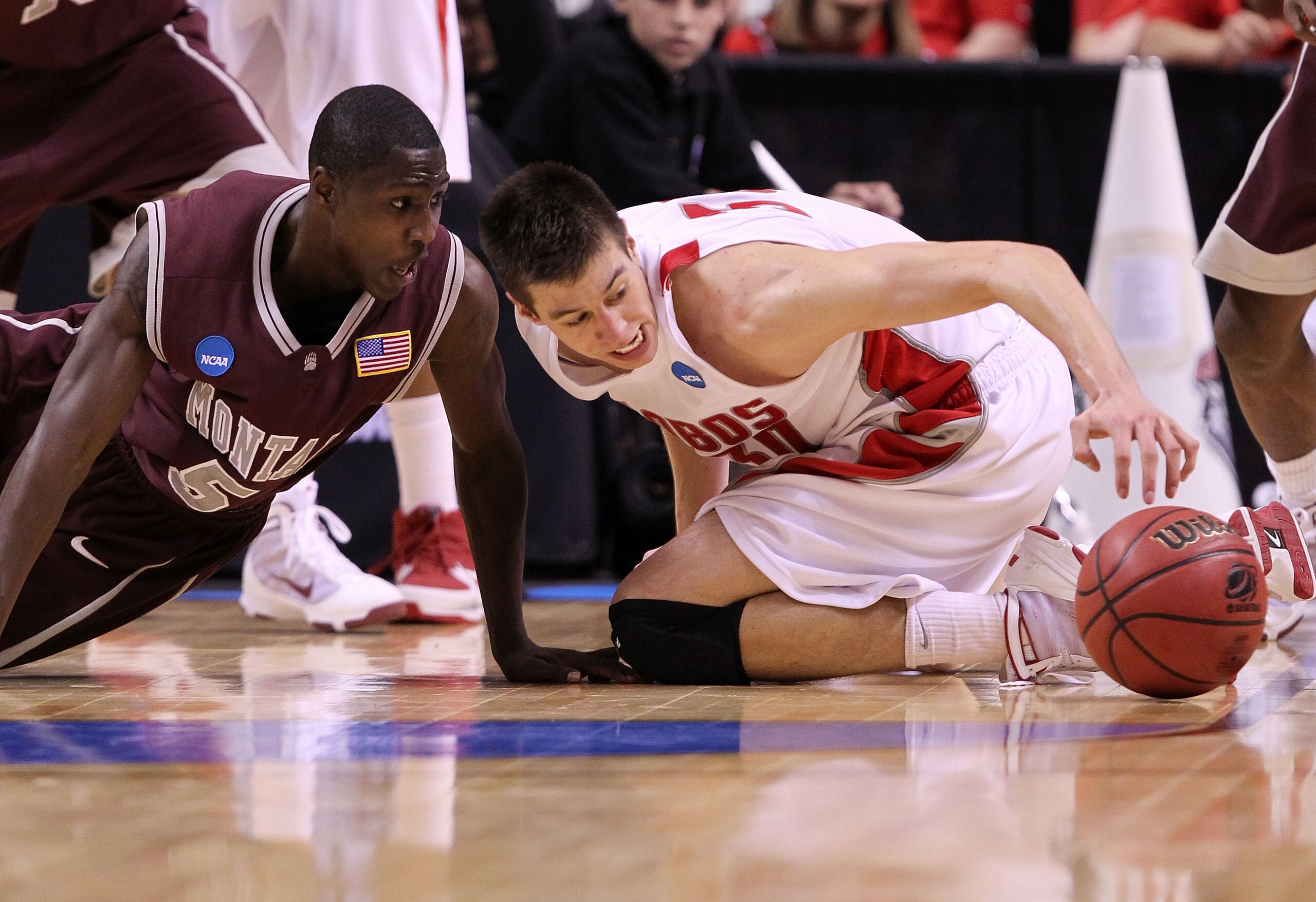 SAN JOSE, CA - MARCH 18:  Guard Will Cherry #5 of the Montana Grizzlies and forward Roman Martinez #30 of the New Mexico Lobos chase after a loose ball during the first round of the 2010 NCAA men's basketball tournament at HP Pavilion on March 18, 2010 in