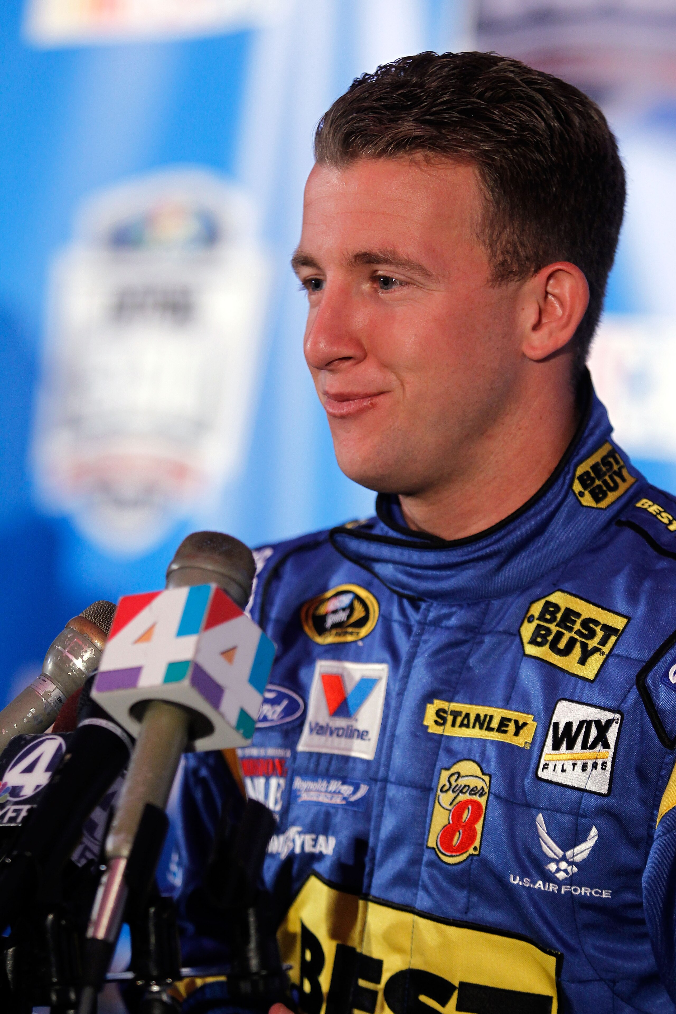 DAYTONA BEACH, FL - FEBRUARY 10:  AJ Allmendinger, driver of the #43 Best Buy Ford, speaks to members of the media during the 2011 NASCAR Media Day at Daytona International Speedway on February 10, 2011 in Daytona Beach, Florida.  (Photo by Todd Warshaw/G