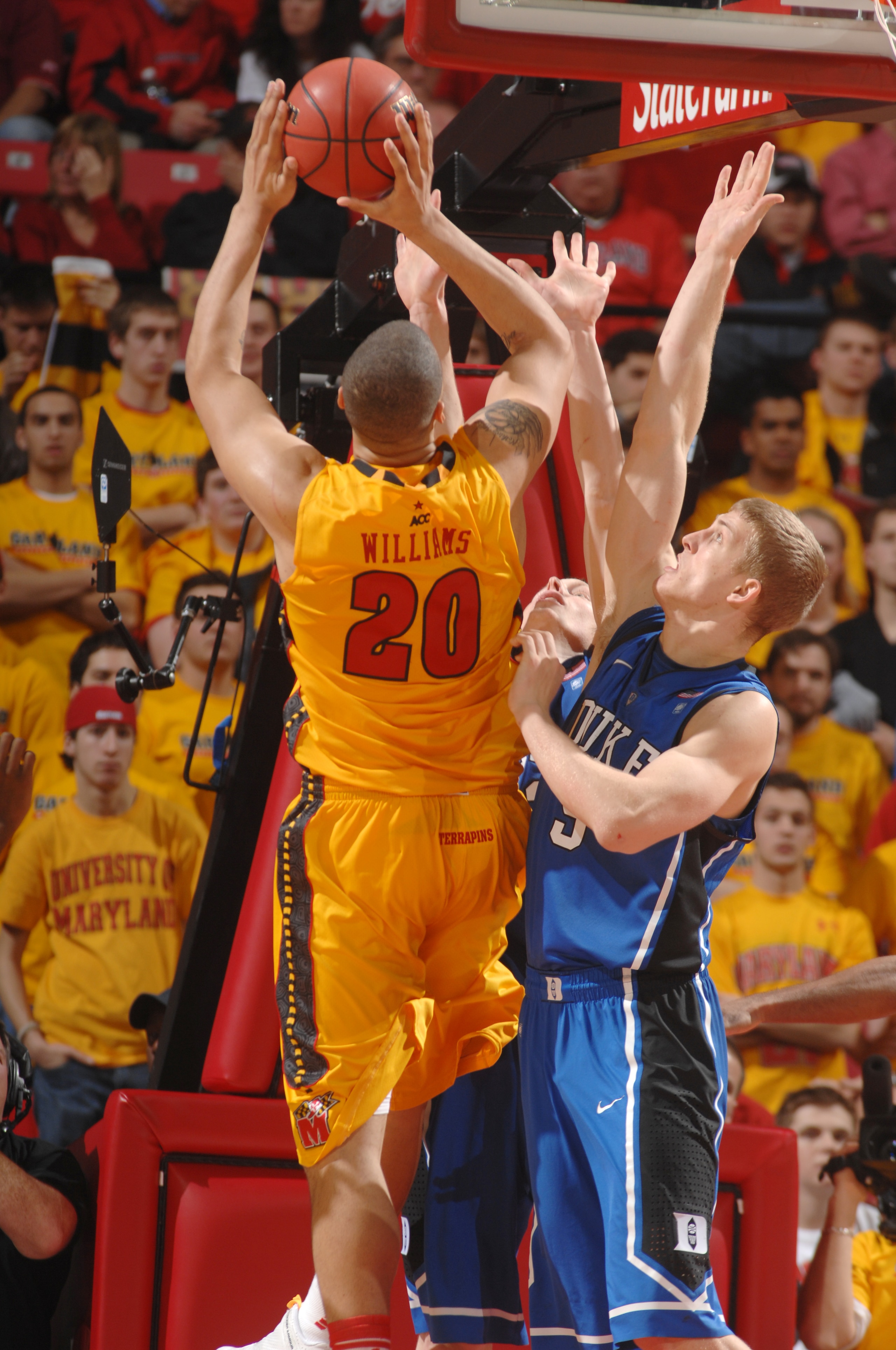 COLLEGE PARK, MD - FEBRUARY 2: Jordan WIlliams #20 of the Maryland Terrapins takes a shot over Mason Plumlee #5 of the Duke Blue Devils during a college basketball game on February 2, 2011 at the Comcast Arena in College Park, Maryland. The Blue Devils wo