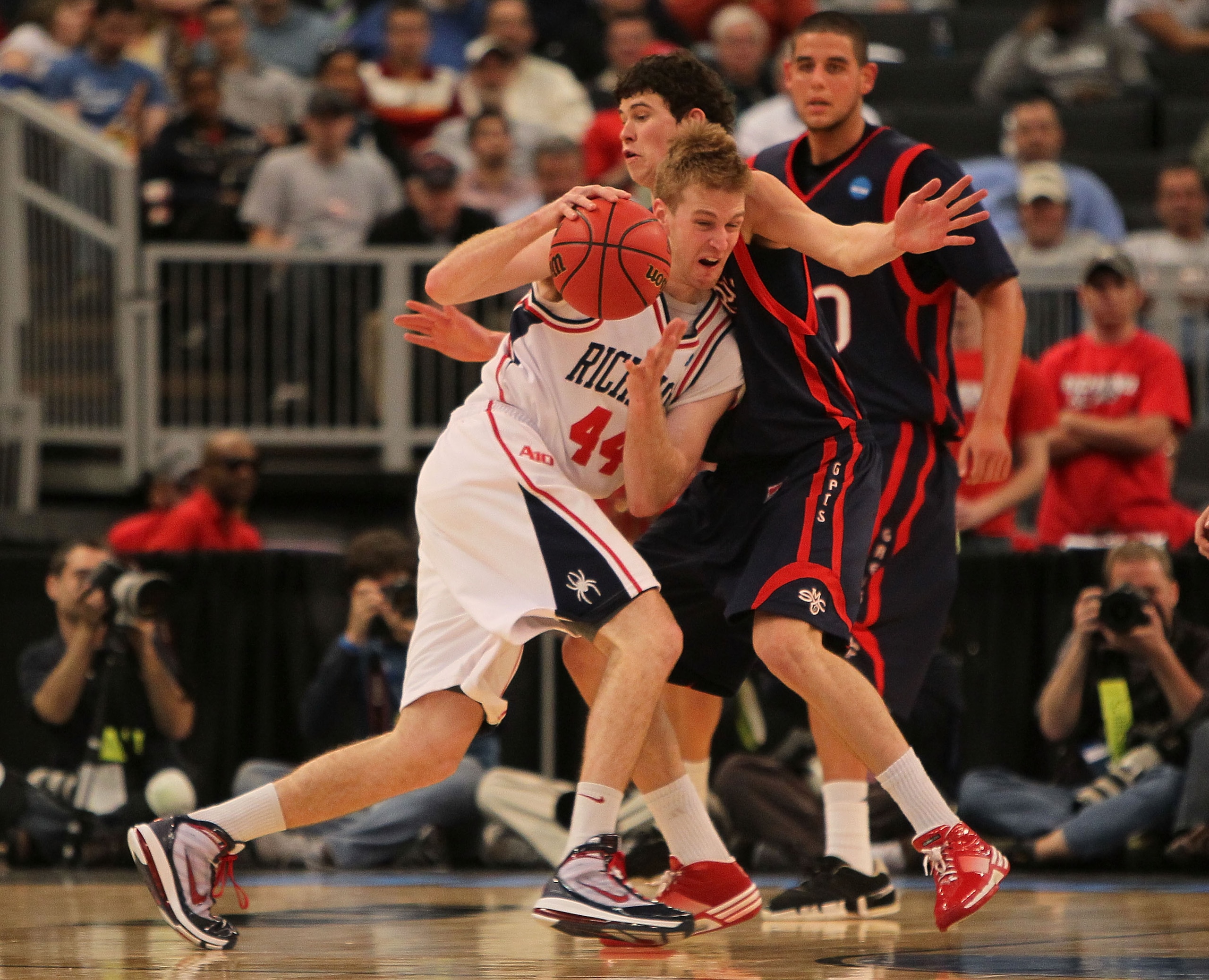PROVIDENCE, RI - MARCH 18:  Clint Stiendl #11 of the Saint Mary's Gaels presses Ryan Butler #44 of the Richmond Spiders during the first round of the 2010 NCAA men's basketball tournament at Dunkin' Donuts Center on March 18, 2010 in Providence, Rhode Isl