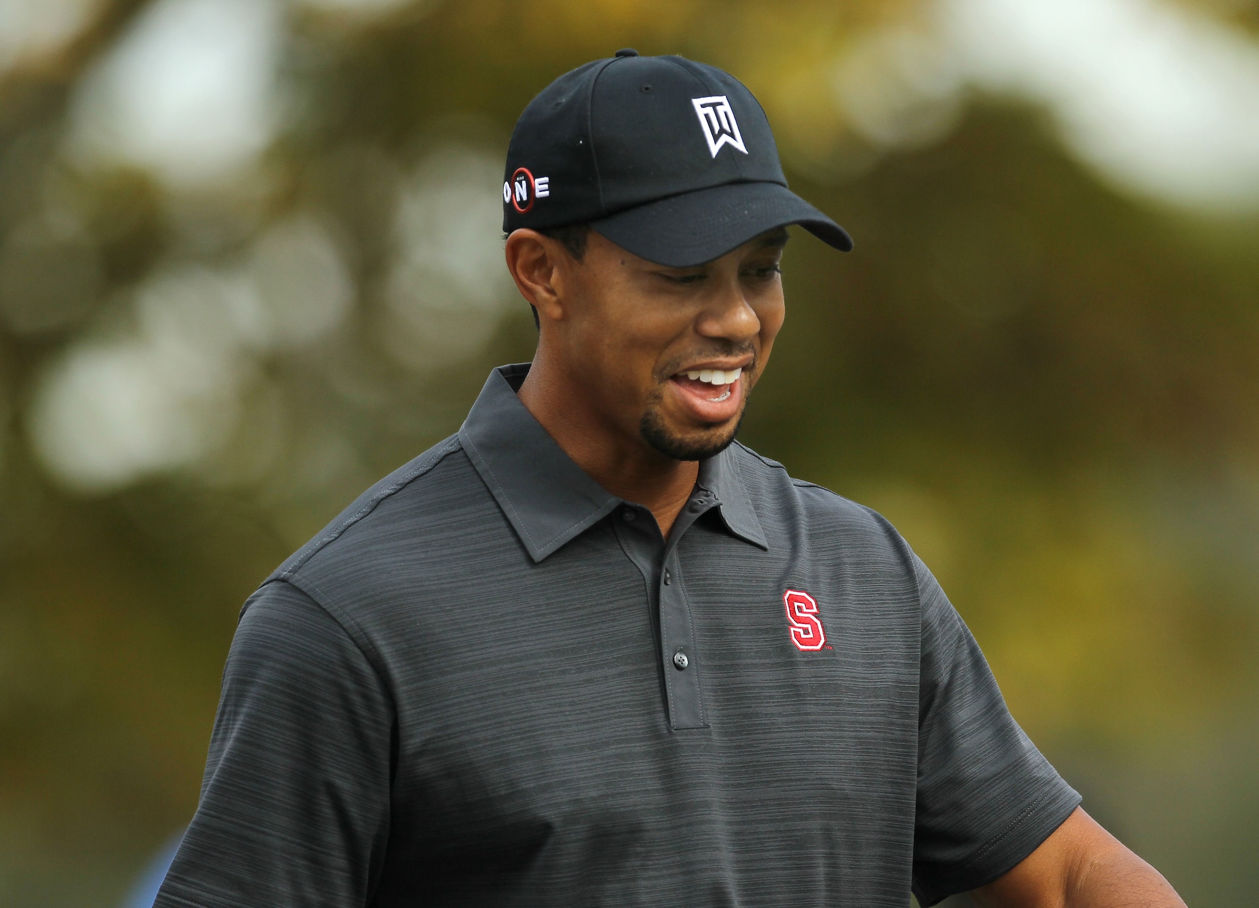 THOUSAND OAKS, CA - DECEMBER 03: Tiger Woods laughs as he walks down the fairway on the fifth hole during round two of the Chevron World Challenge at Sherwood Country Club on December 3, 2010 in Thousand Oaks, California. (Photo by Stephen Dunn/Getty Im THOUSAND OAKS, CA - DECEMBER 03: Tiger Woods laughs as he walks down the fairway on the fifth hole during round two of the Chevron World Challenge at Sherwood Country Club on December 3, 2010 in Thousand Oaks, California. (Photo by Stephen Dunn/Getty Im