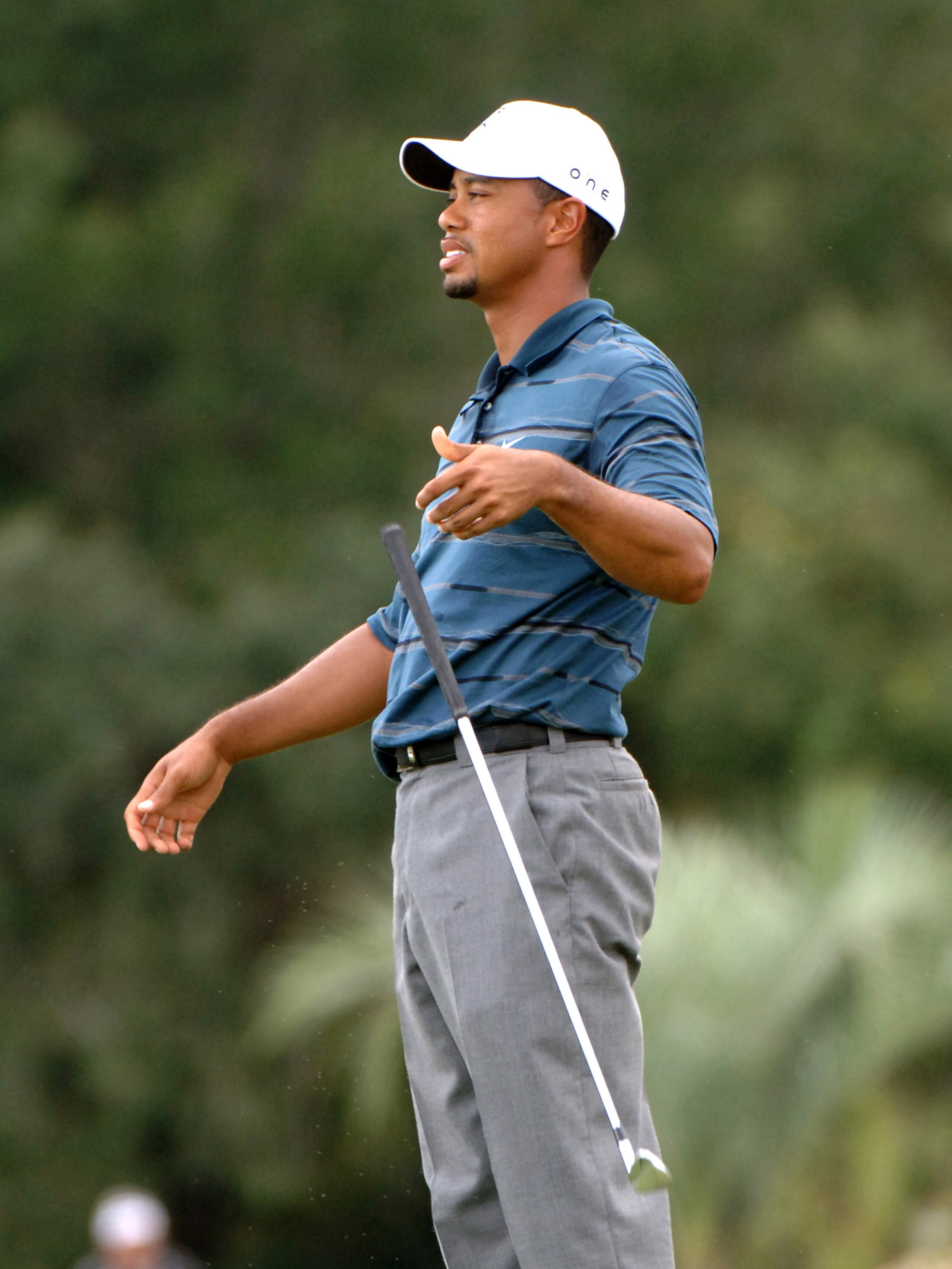 UNITED STATES - OCTOBER 20: Tiger Woods misses a birdie putt on the 18th hole and tosses his putter during the first round of the 2005 Funai Classic at World Disney World Resort on October 20, 2005. (Photo by Al Messerschmidt/Getty Images) UNITED STATES - OCTOBER 20: Tiger Woods misses a birdie putt on the 18th hole and tosses his putter during the first round of the 2005 Funai Classic at World Disney World Resort on October 20, 2005. (Photo by Al Messerschmidt/Getty Images)