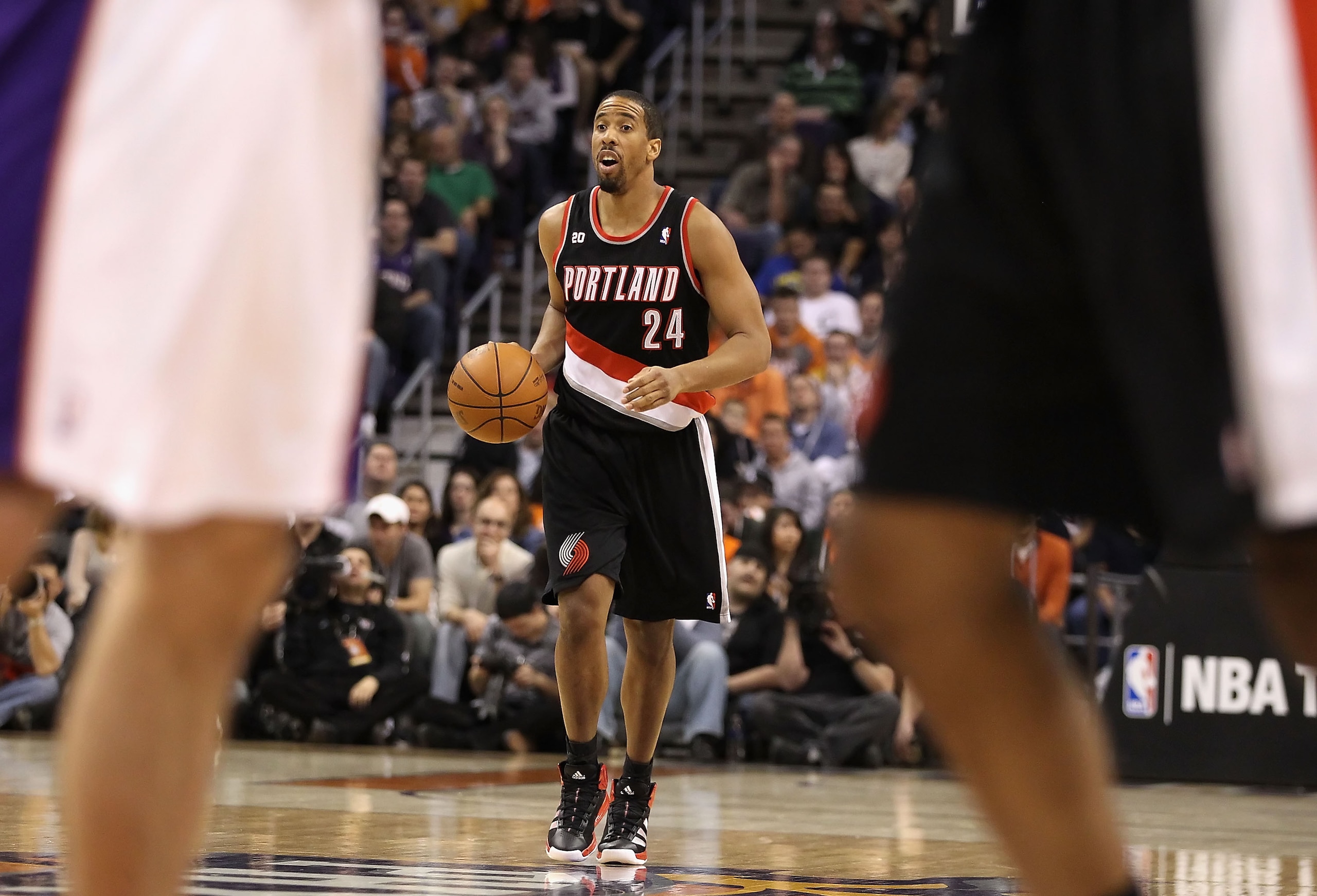 PHOENIX, AZ - JANUARY 14: Andre Miller #24 of the Portland Trail Blazers handles the ball during the NBA game against the Phoenix Suns at US Airways Center on January 14, 2011 in Phoenix, Arizona. The Suns defeated the Trail Blazers 115-111. NOTE TO USER PHOENIX, AZ - JANUARY 14: Andre Miller #24 of the Portland Trail Blazers handles the ball during the NBA game against the Phoenix Suns at US Airways Center on January 14, 2011 in Phoenix, Arizona. The Suns defeated the Trail Blazers 115-111. NOTE TO USER