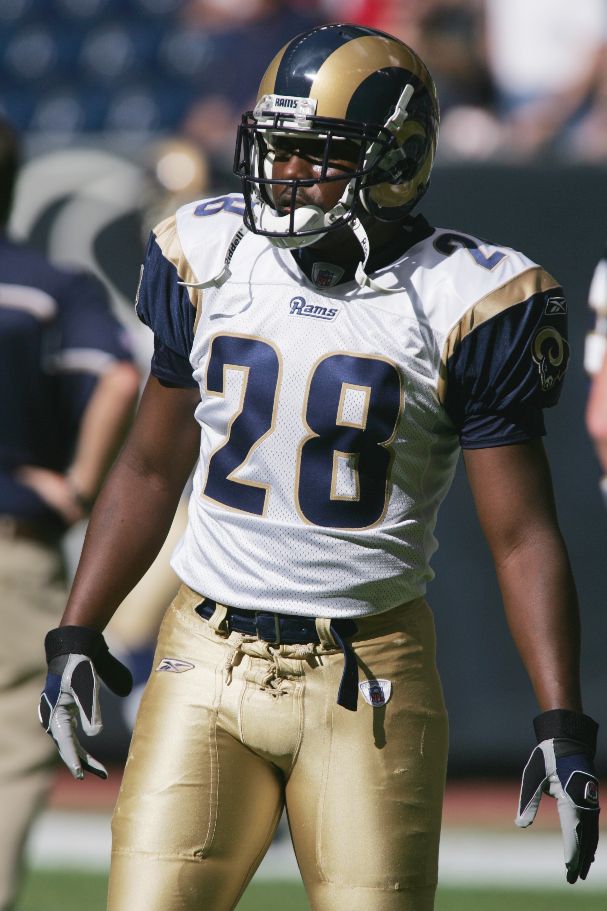 HOUSTON - NOVEMBER 27:  Running back Marshall Faulk #28 of the St. Louis Rams looks on against the Houston Texans at Reliant Stadium on November 27, 2005  in Houston, Texas. The Rams defeated the Texans 33-27 in overtime. (Photo by Ronald Martinez/Getty I