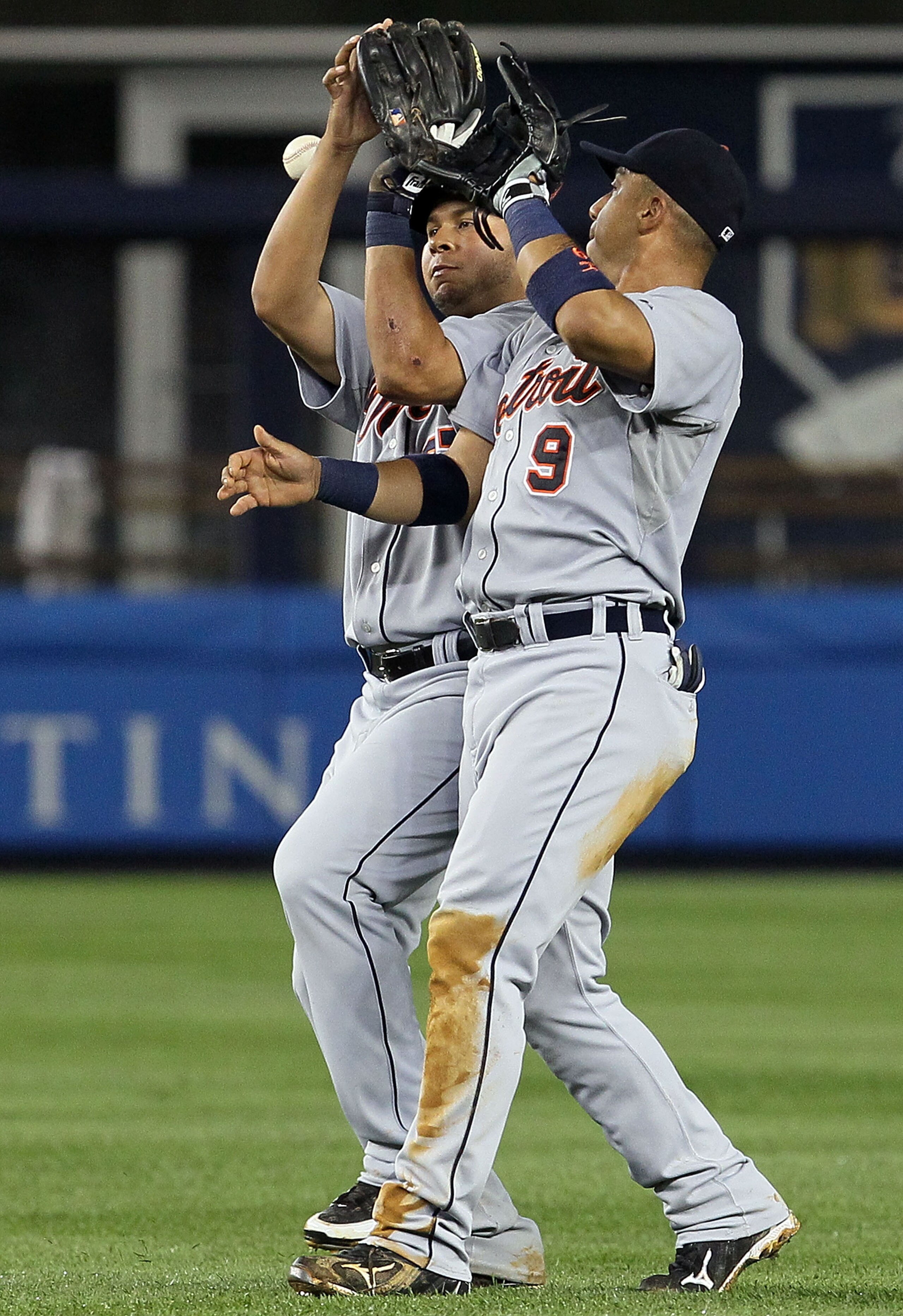 NEW YORK - AUGUST 16: Jhonny Peralta #27 and Carlos Guillen #9 of the Detroit Tigers collide and drop a pop up in the fourth inning against the New York Yankees on August 16, 2010 at Yankee Stadium in the Bronx borough of New York City. (Photo by Jim Mc NEW YORK - AUGUST 16: Jhonny Peralta #27 and Carlos Guillen #9 of the Detroit Tigers collide and drop a pop up in the fourth inning against the New York Yankees on August 16, 2010 at Yankee Stadium in the Bronx borough of New York City. (Photo by Jim Mc