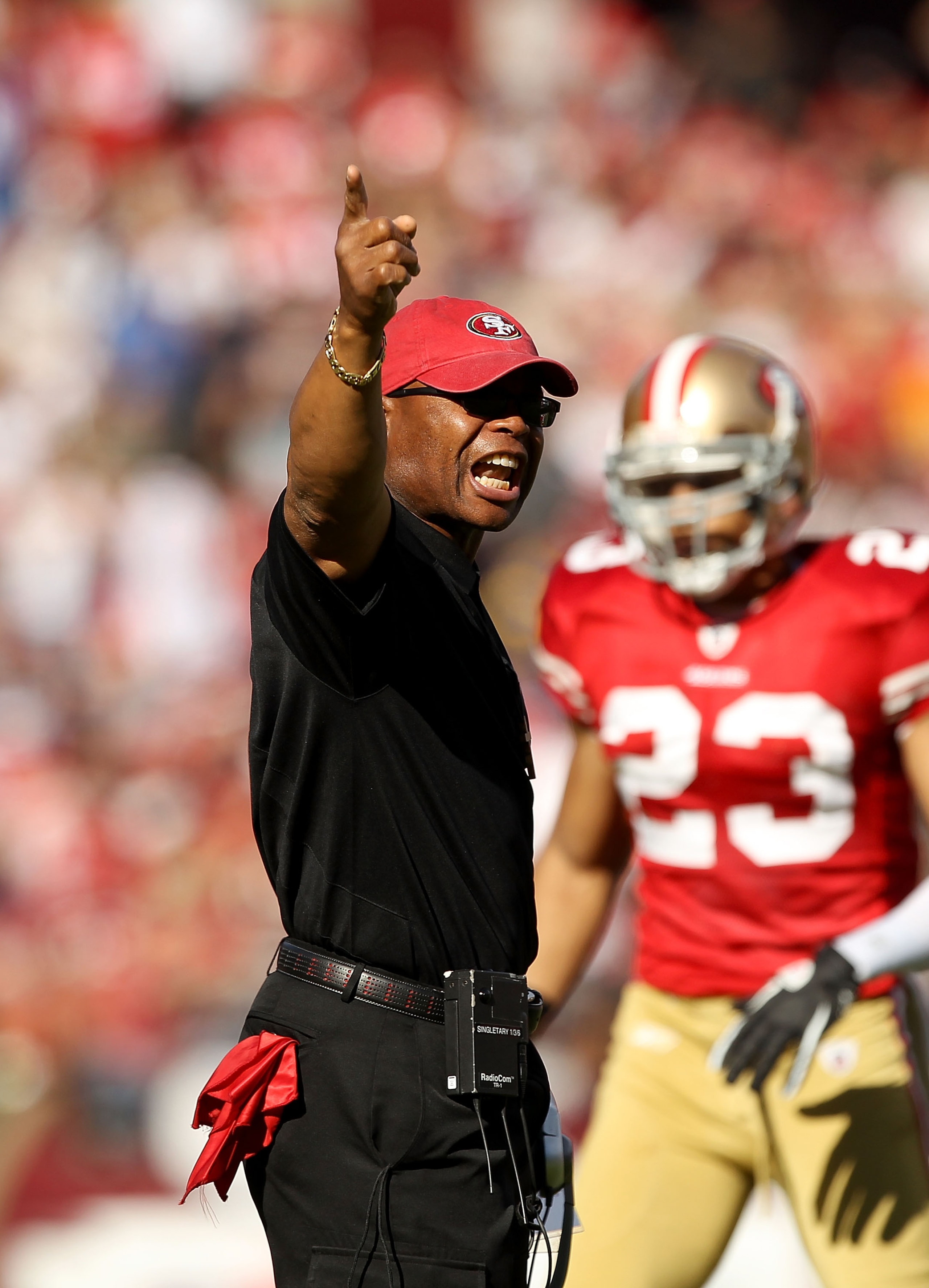 SAN FRANCISCO - NOVEMBER 14:  Head coach Mike Singletary of the San Francisco 49ers shouts on the sidelines during their game against the St. Louis Rams at Candlestick Park on November 14, 2010 in San Francisco, California.  (Photo by Ezra Shaw/Getty Imag