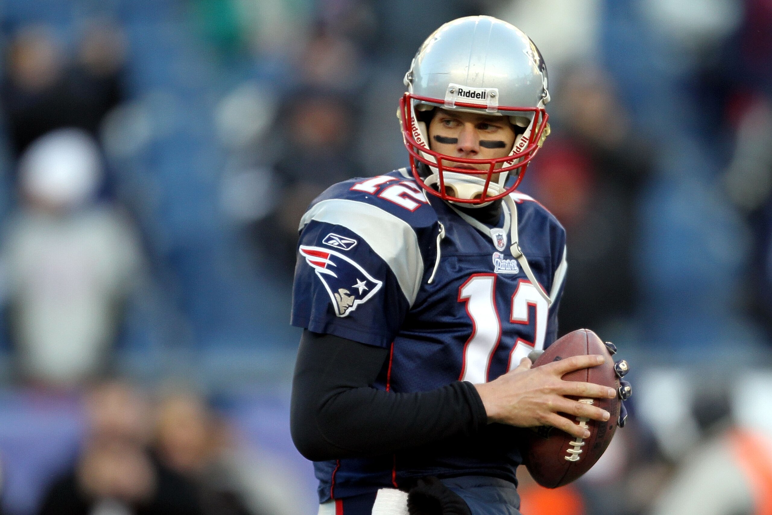 FOXBORO, MA - JANUARY 16:  Tom Brady #12 of the New England Patriots warms up prior to their game against the New York Jets during their 2011 AFC divisional playoff game at Gillette Stadium on January 16, 2011 in Foxboro, Massachusetts.  (Photo by Jim Rog