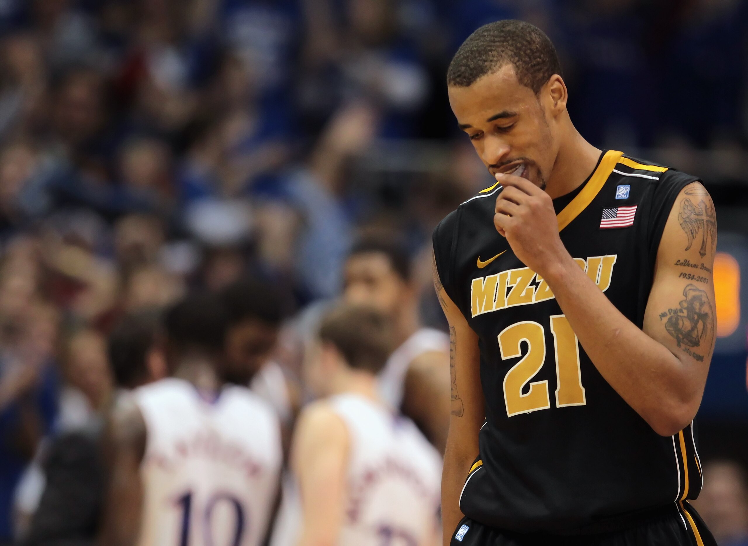 LAWRENCE, KS - FEBRUARY 07:  Laurence Bowers #21 of the Missouri Tigers reacts after a foul during the game against the Kansas Jayhawks on February 7, 2011 at Allen Fieldhouse in Lawrence, Kansas.  (Photo by Jamie Squire/Getty Images)