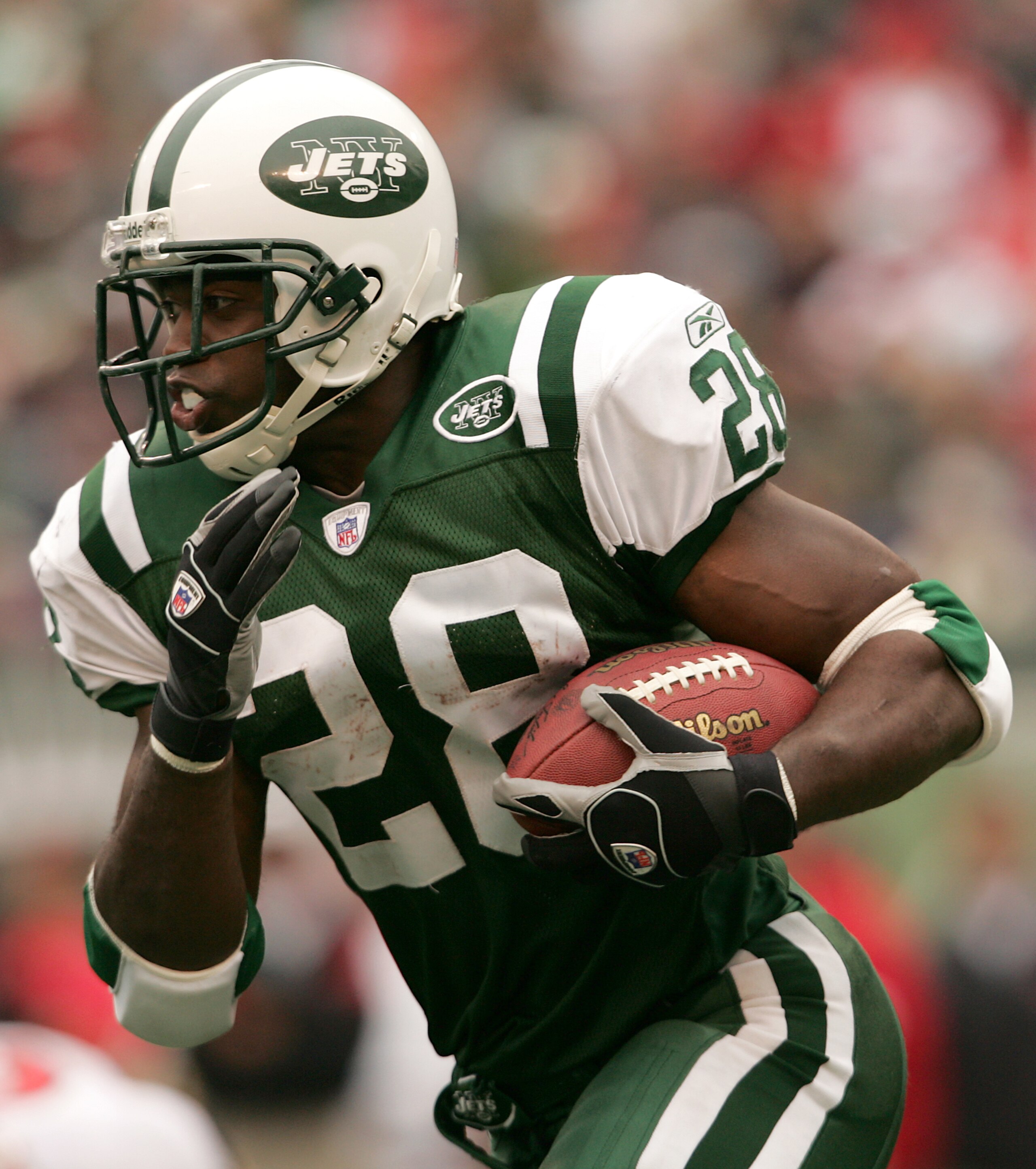 EAST RUTHERFORD, NJ - OCTOBER 9: Curtis Martin #28 of the New York Jets takes the ball forward against the Tampa Bay Buccaneers on October 9, 2005 at Giants Stadium in East Rutherford, New Jersey. The Jets defeated the Buccaneers 14-12. (Photo by Nick Lah