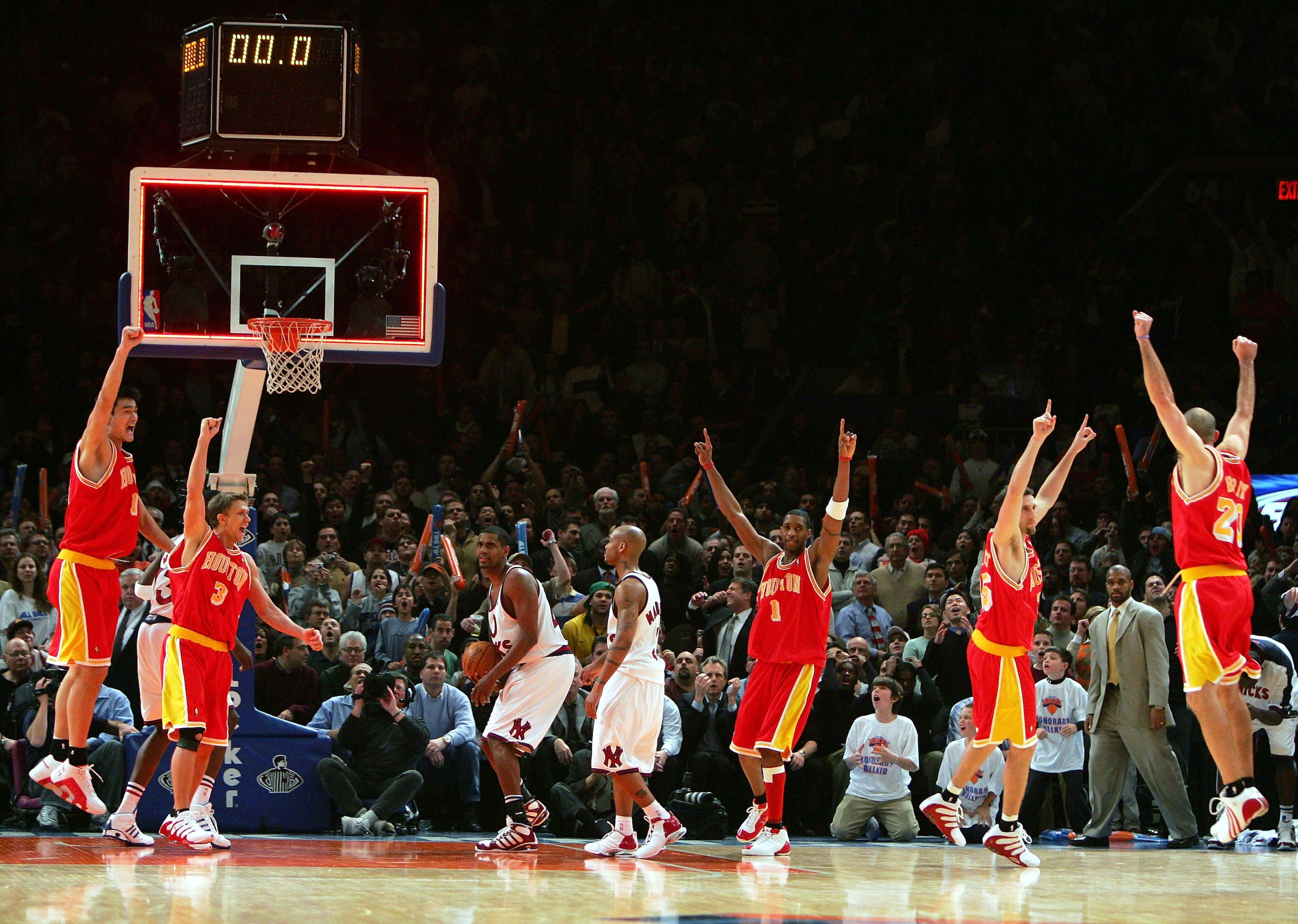 NEW YORK - JANUARY 21:  The Houston Rockets celebrate after Scott Padgett #35 hits a shot at the buzzer to beat the New York Knicks on January 21, 2005 at Madison Square Garden in New York City. The Rockets defeated the Knicks 92-91.  NOTE TO USER: User e