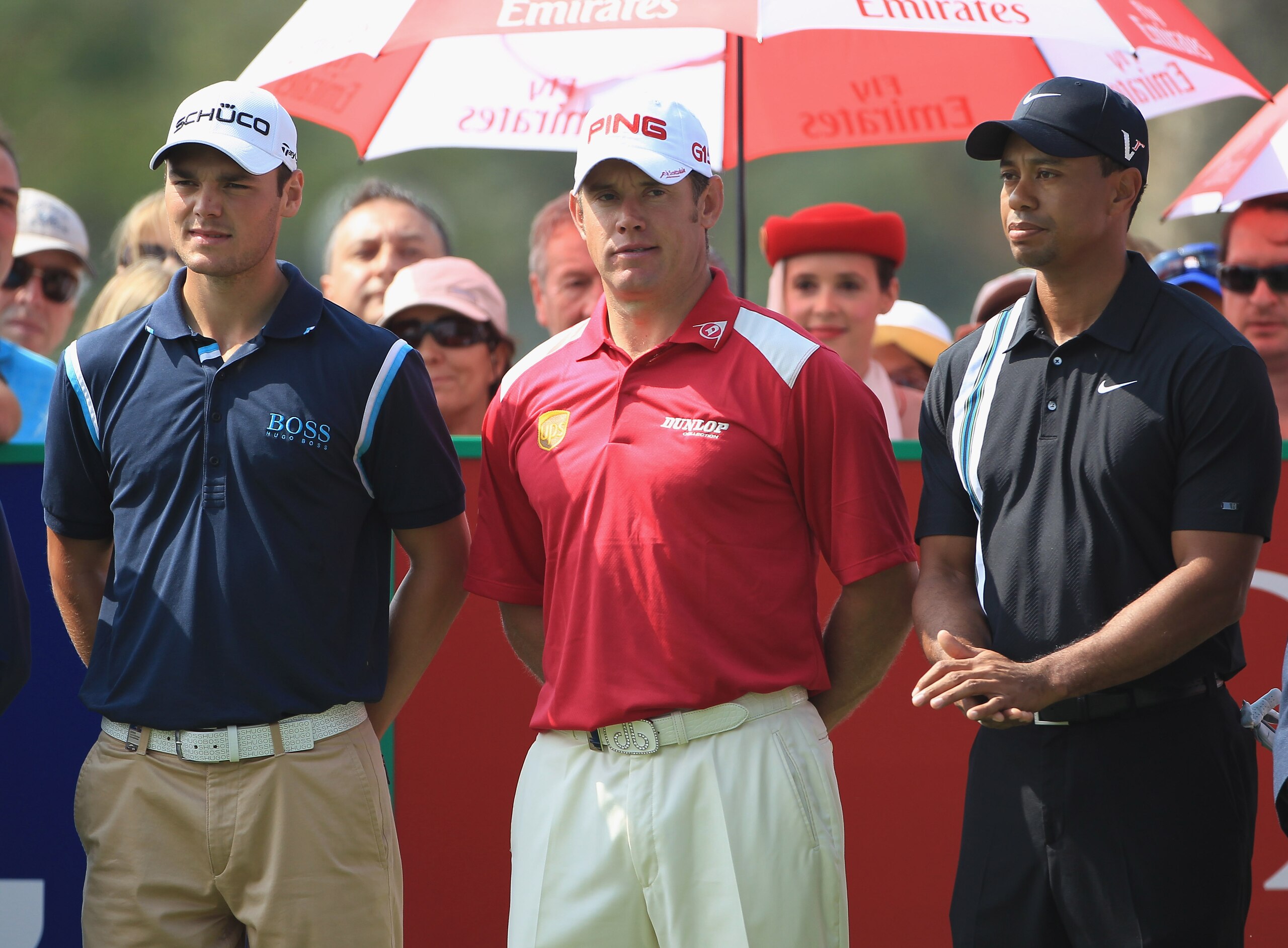 DUBAI, UNITED ARAB EMIRATES - FEBRUARY 10:  Lee Westwood of England the world's number 1, is flanked by Martin Kaymer of Germany (left) the world's number 2, and Tiger Woods of the USA (right) the world's number 3, on the 1st tee during the first round of