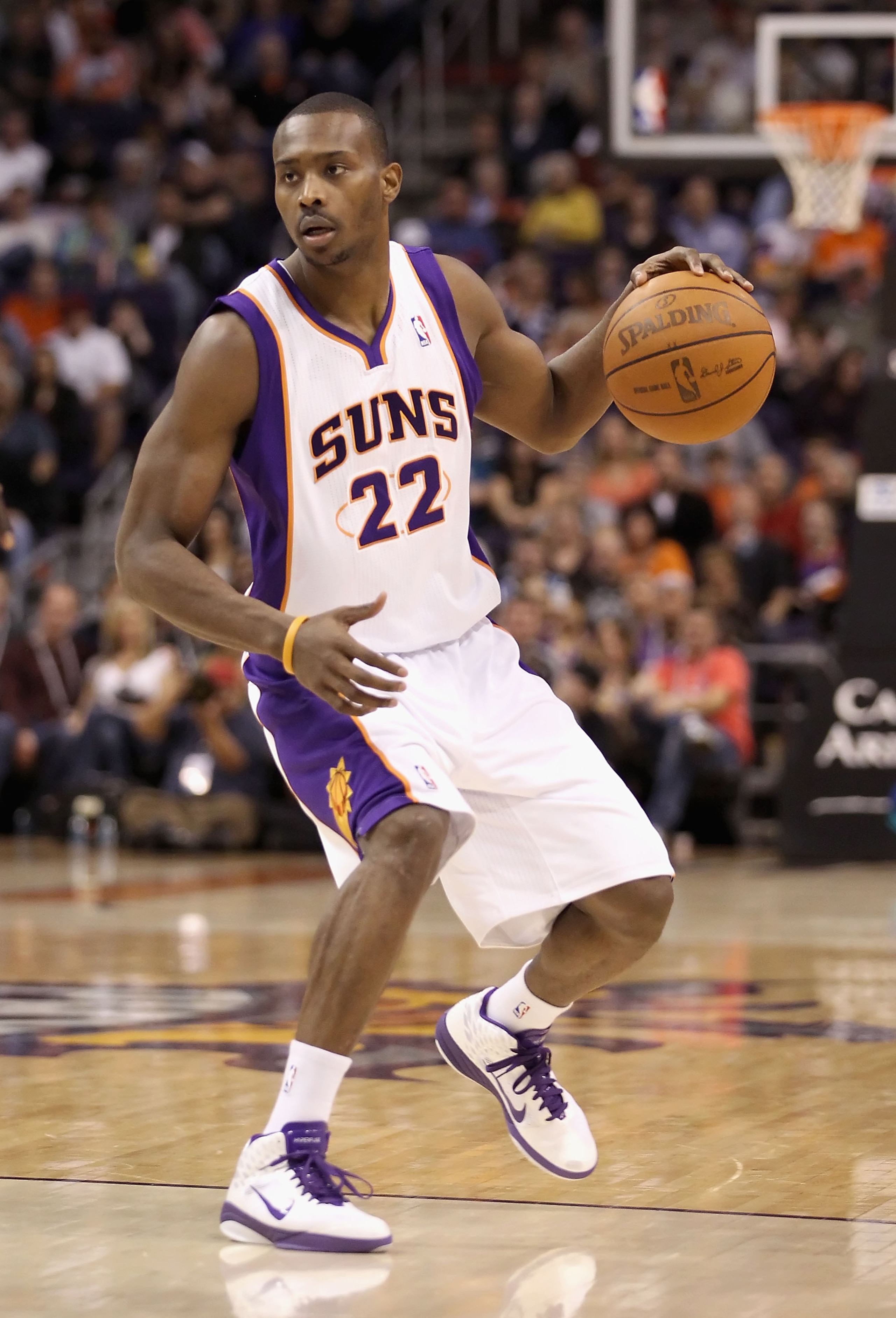 PHOENIX, AZ - JANUARY 30:  Zabian Dowdell #22 of the Phoenix Suns handles the ball during the NBA game against the New Orleans Hornets at US Airways Center on January 30, 2011 in Phoenix, Arizona.  The Suns defeated the Hornets 104-102. NOTE TO USER: User