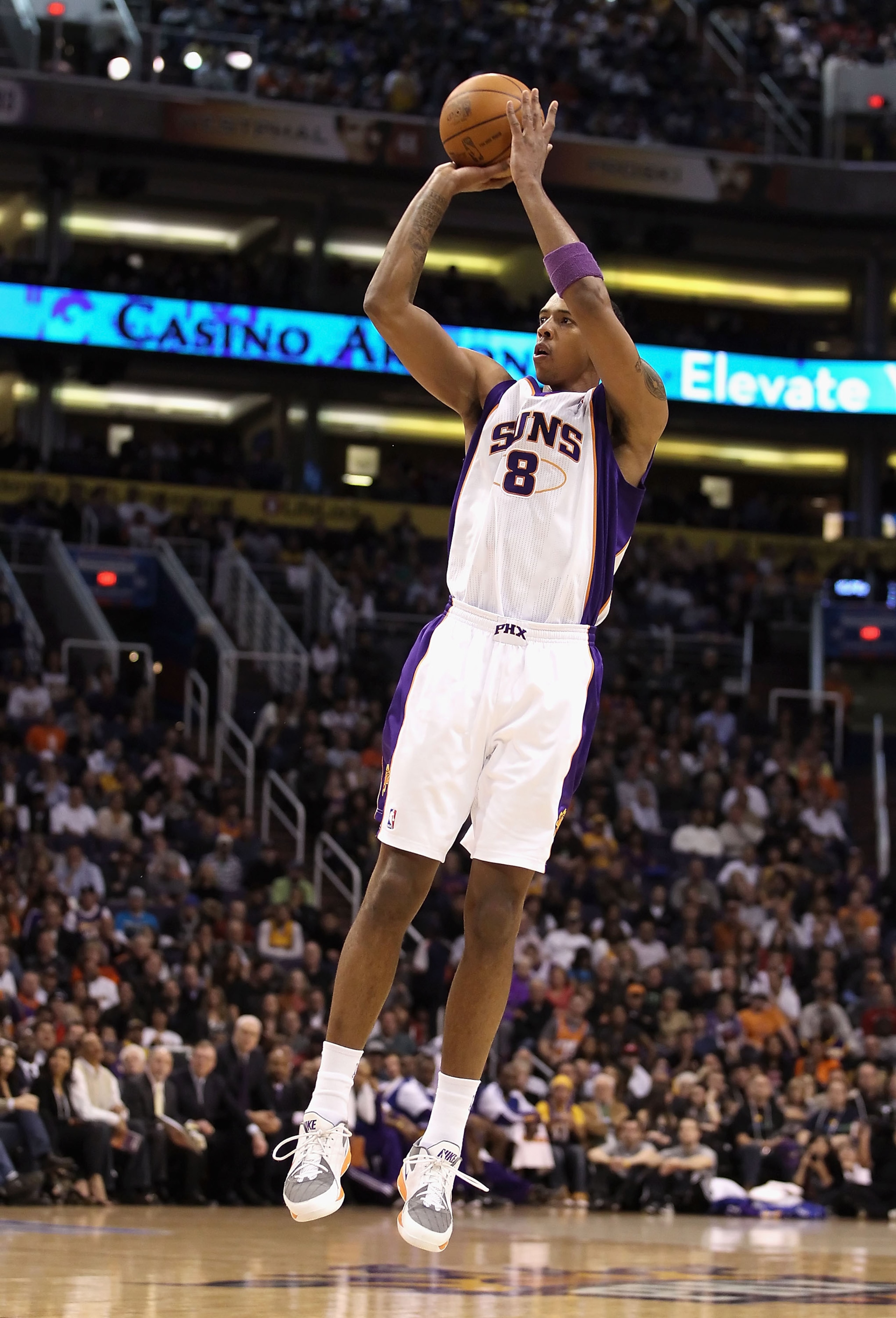 PHOENIX, AZ - JANUARY 05:  Channing Frye #8 of the Phoenix Suns puts up a shot during the NBA game against the Los Angeles Lakers at US Airways Center on January 5, 2011 in Phoenix, Arizona. The Lakers defeated the Suns 99-95.  NOTE TO USER: User expressl