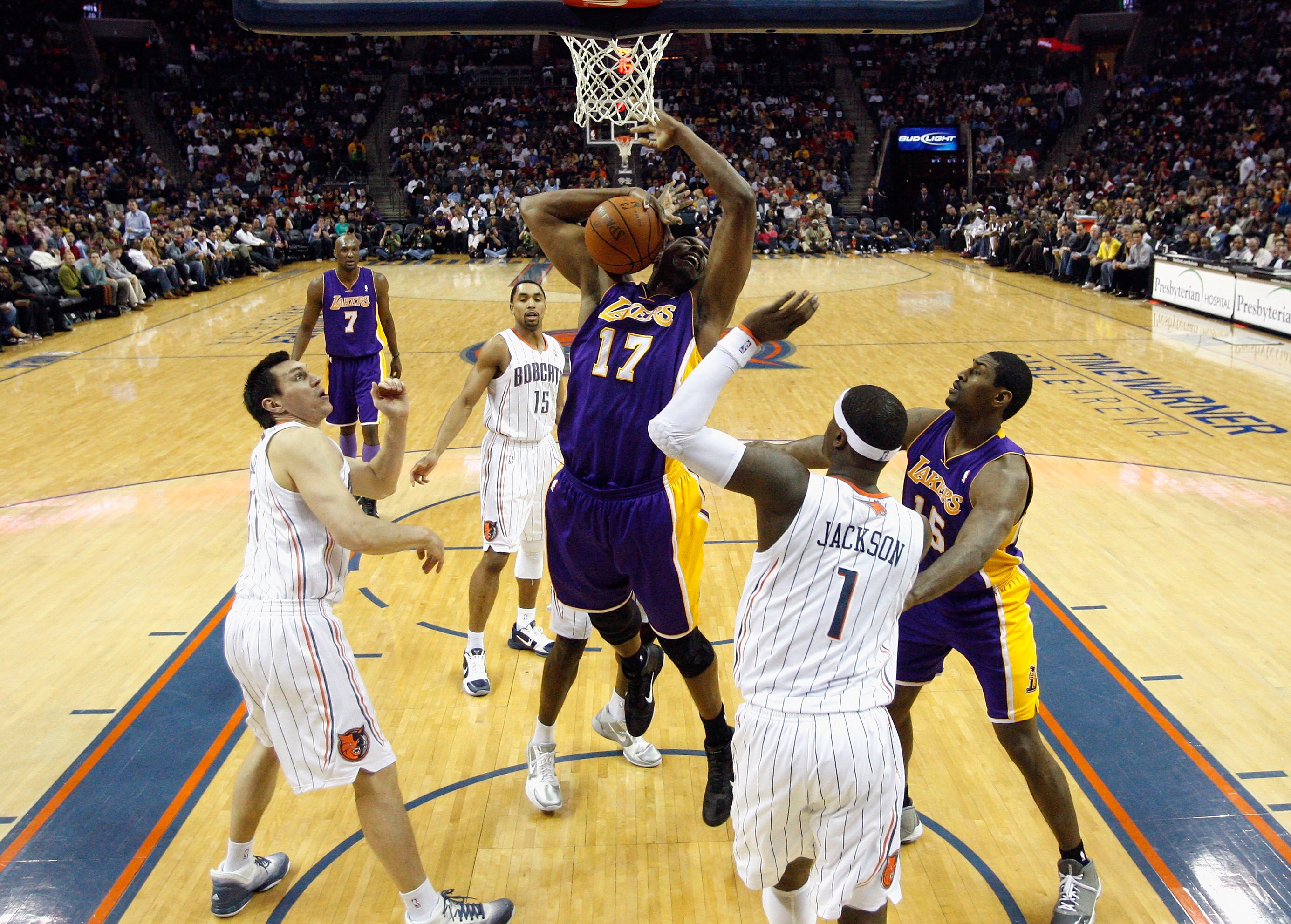 CHARLOTTE, NC - FEBRUARY 14:  Andrew Bynum #17 of the Los Angeles Lakers has the ball knocked away by the Charlotte Bobcats during their game at Time Warner Cable Arena on February 14, 2011 in Charlotte, North Carolina. NOTE TO USER: User expressly acknow