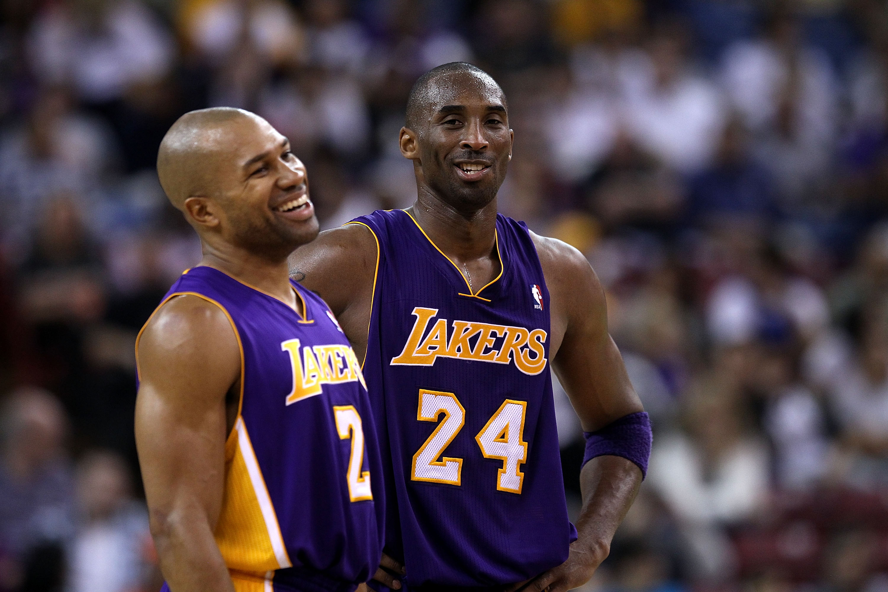 SACRAMENTO, CA - NOVEMBER 03:  Kobe Bryant #24 talks with Derek Fisher #2 of the Los Angeles Lakers during their game against the Sacramento Kings at ARCO Arena on November 3, 2010 in Sacramento, California.  NOTE TO USER: User expressly acknowledges and