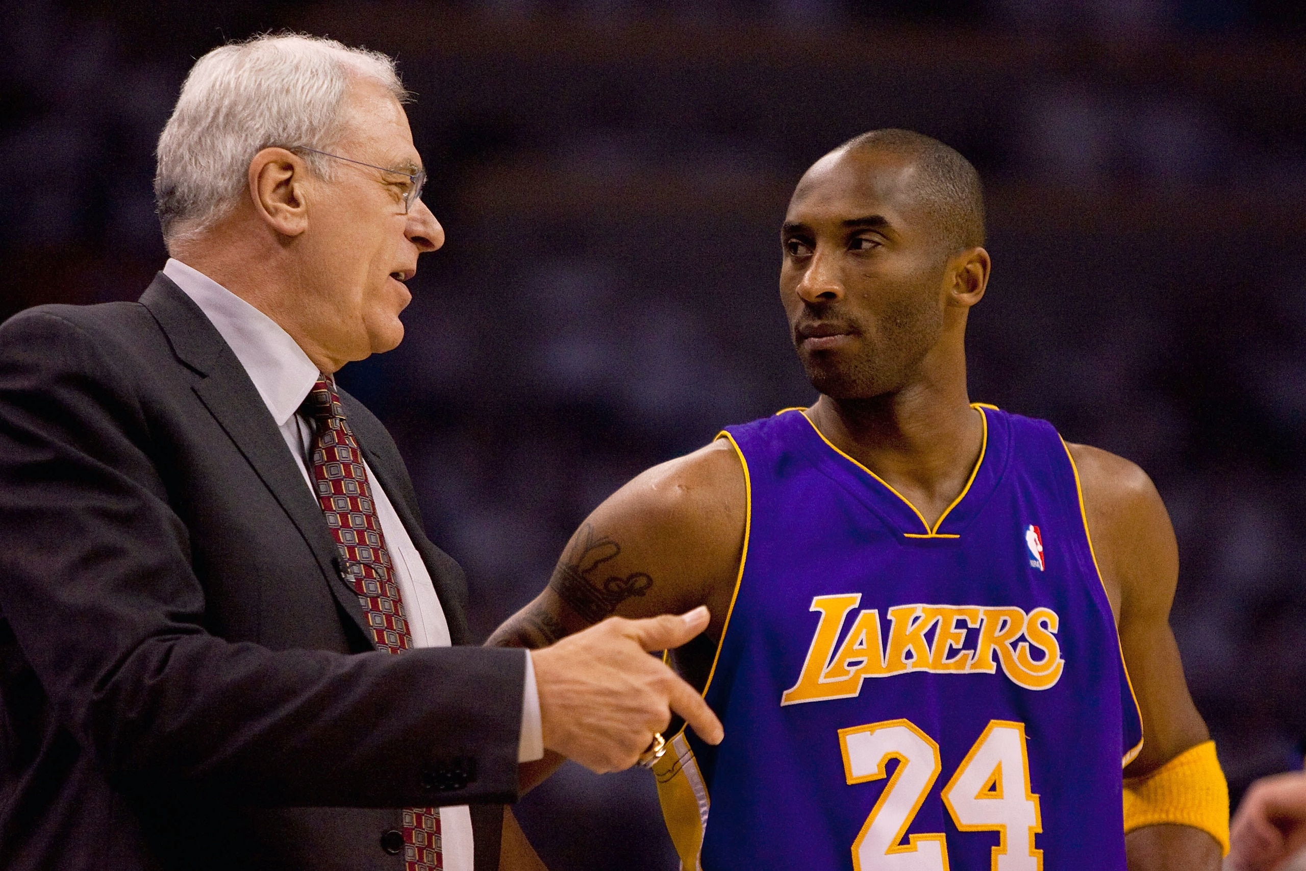 OKLAHOMA CITY - APRIL 24: Head coach Phil Jackson and Kobe Bryant #24 of the Los Angeles Lakers talk prior to playing against the Oklahoma City Thunder during Game Four of the Western Conference Quarterfinals of the 2010 NBA Playoffs on April 24, 2010 at OKLAHOMA CITY - APRIL 24: Head coach Phil Jackson and Kobe Bryant #24 of the Los Angeles Lakers talk prior to playing against the Oklahoma City Thunder during Game Four of the Western Conference Quarterfinals of the 2010 NBA Playoffs on April 24, 2010 at