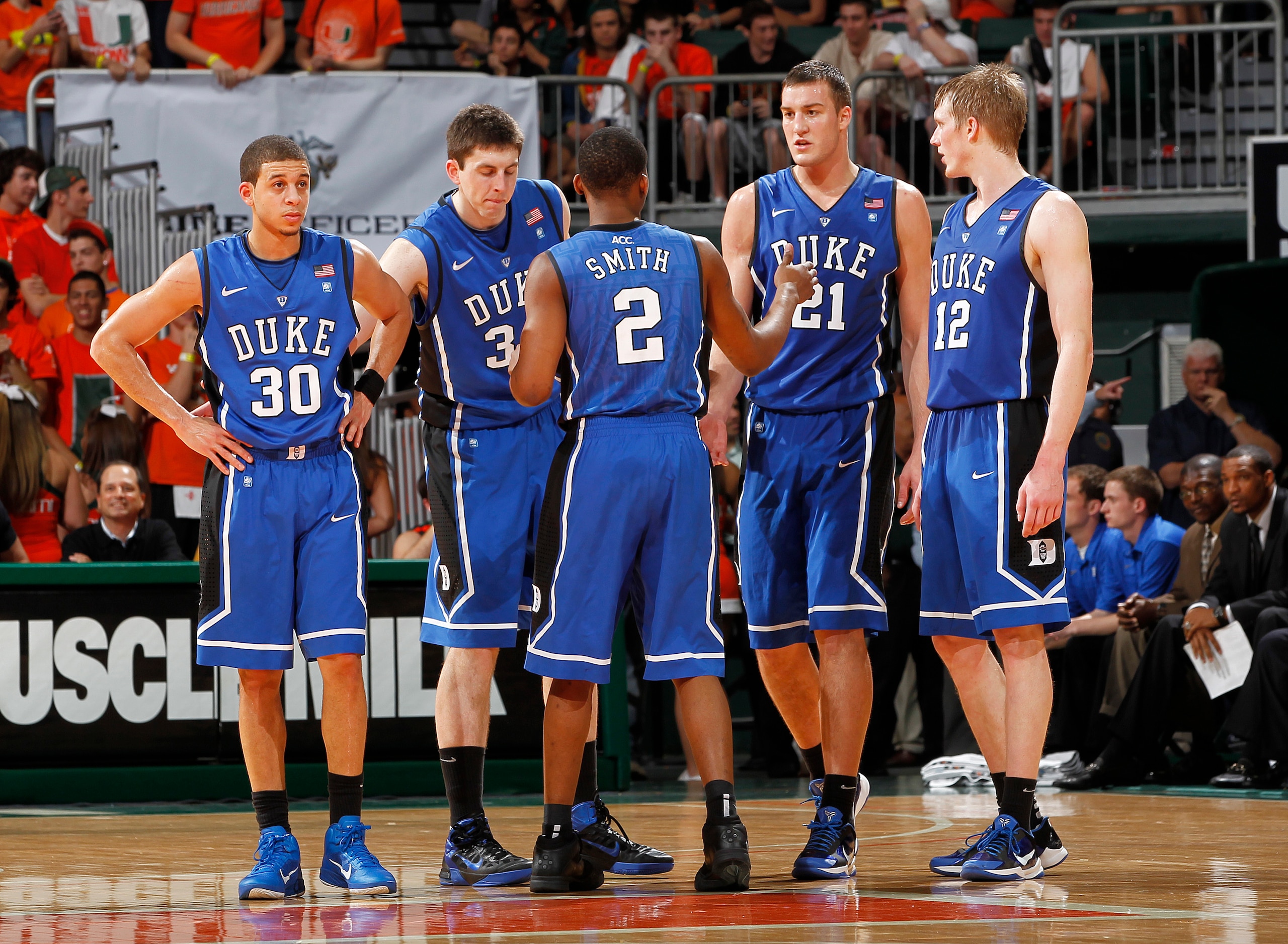 CORAL GABLES, FL - FEBRUARY 13: Nolan Smith #2 of the Duke Blue Devils talks to his teammates as they come back on court after a time out against the Miami Hurricanes on February 13, 2011 at the BankUnited Center in Coral Gables, Florida. The Blue Devils