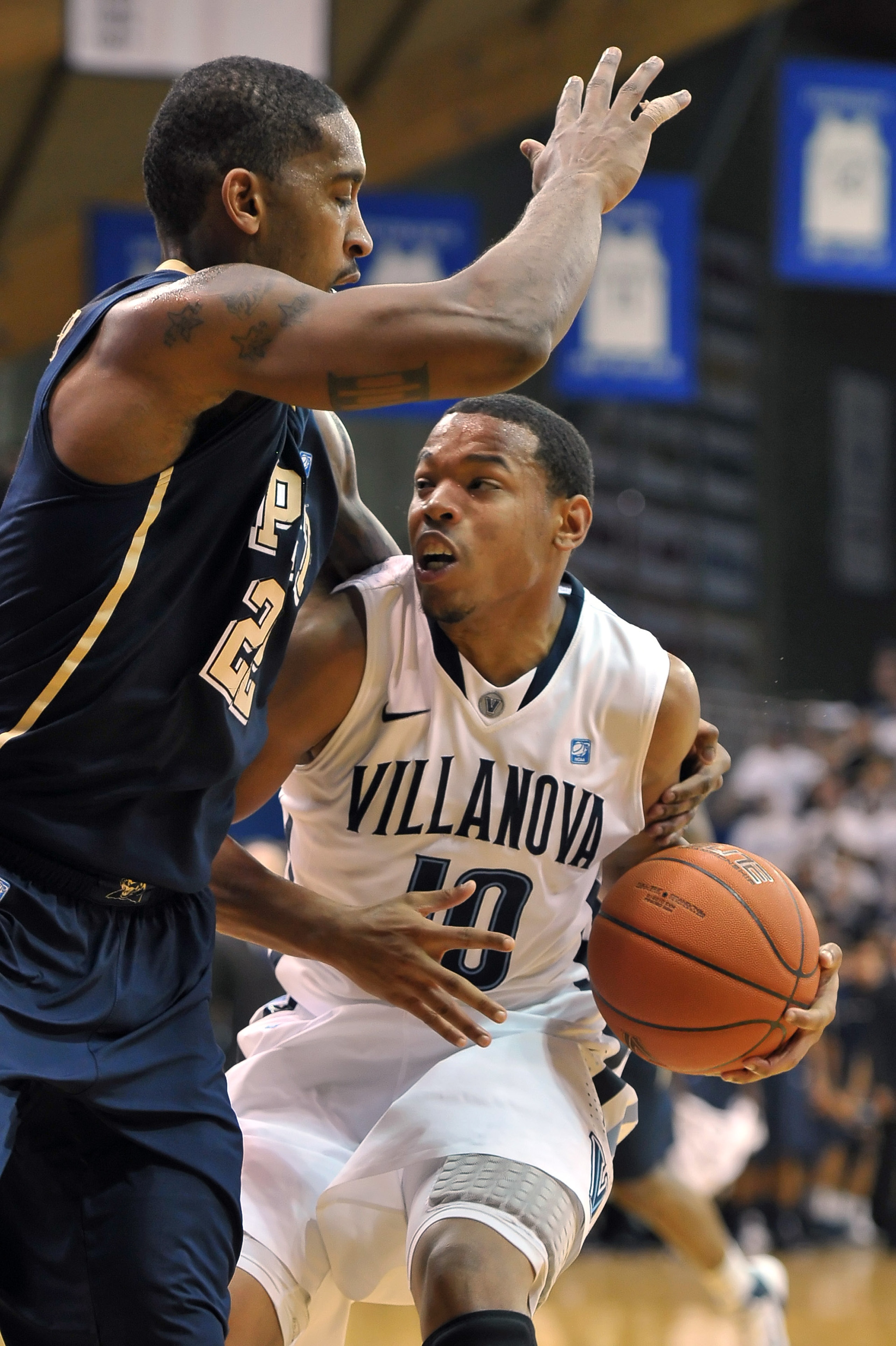 VILLANOVA, PA - FEBRUARY 12: Corey Fisher #10 of the Villanova Wildcats gets held by Brad Wanamaker #22 of the Pittsburgh Panthers at The Pavilion on February 12, 2011 in Villanova, Pennsylvania. Pittsburgh won 57-54.  (Photo by Drew Hallowell/Getty Image