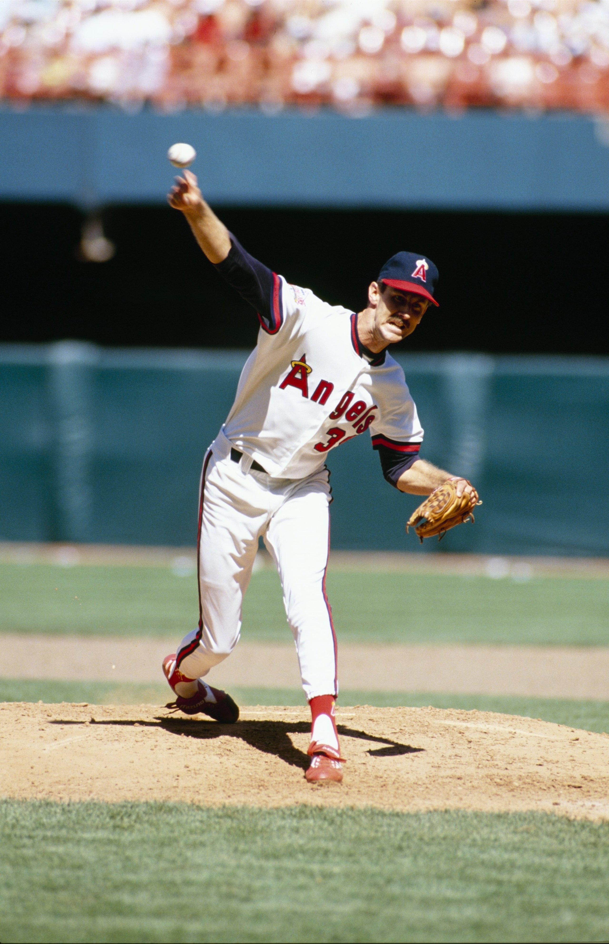 ANAHEIM, CA - 1989: Mike Witt of the California Angels pitches during a game in the 1989 season at Anaheim Stadium in Anaheim, California. (Photo by Tim DeFrisco/Getty Images) ANAHEIM, CA - 1989: Mike Witt of the California Angels pitches during a game in the 1989 season at Anaheim Stadium in Anaheim, California. (Photo by Tim DeFrisco/Getty Images)