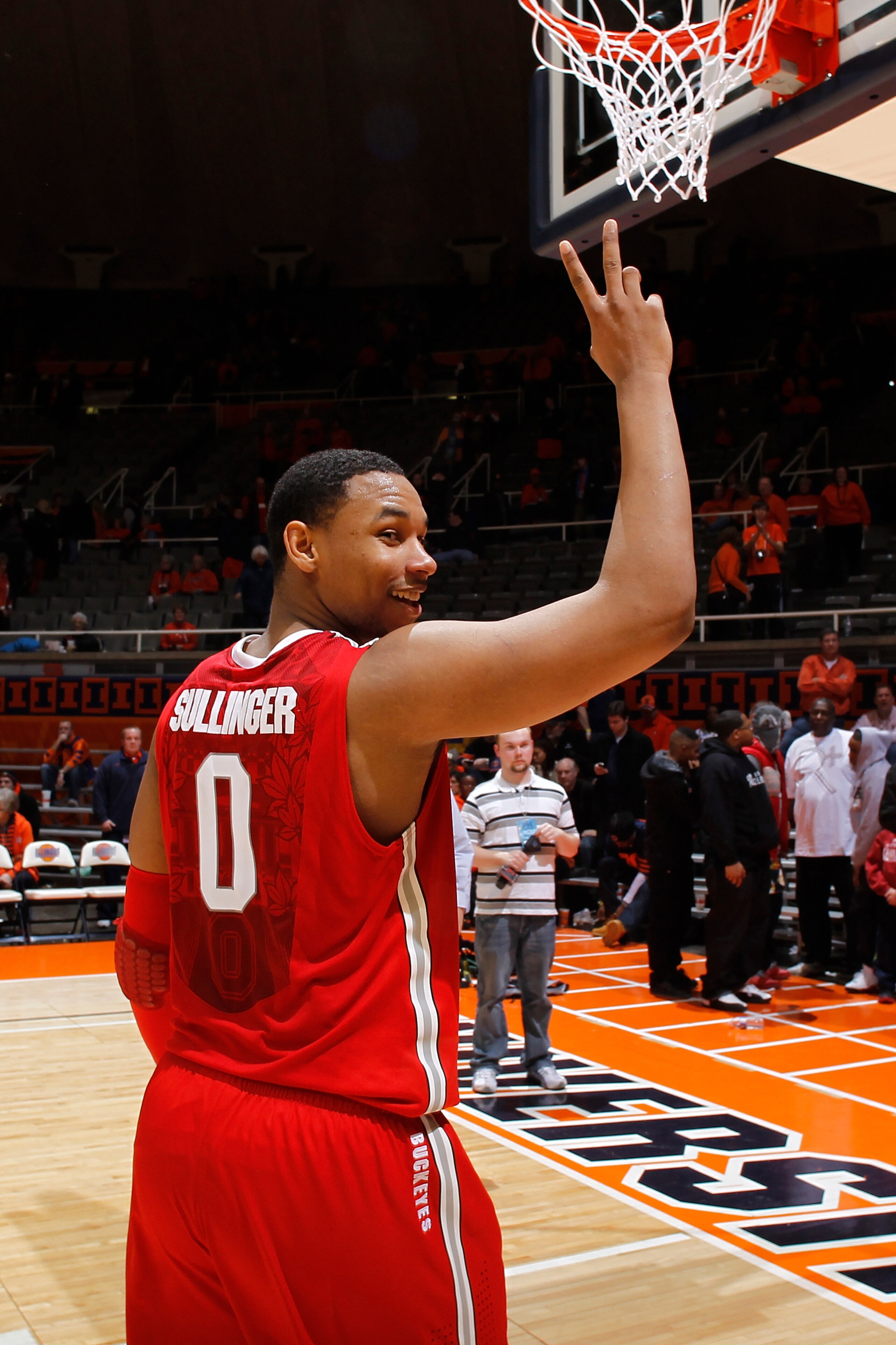 CHAMPAIGN, IL - JANUARY 22: Jared Sullinger #0 of the Ohio State Buckeyes gestures toward the student section as he leaves the floor after the game against the Illinois Fighting Illini at Assembly Hall on January 22, 2011 in Champaign, Illinois. Ohio Stat