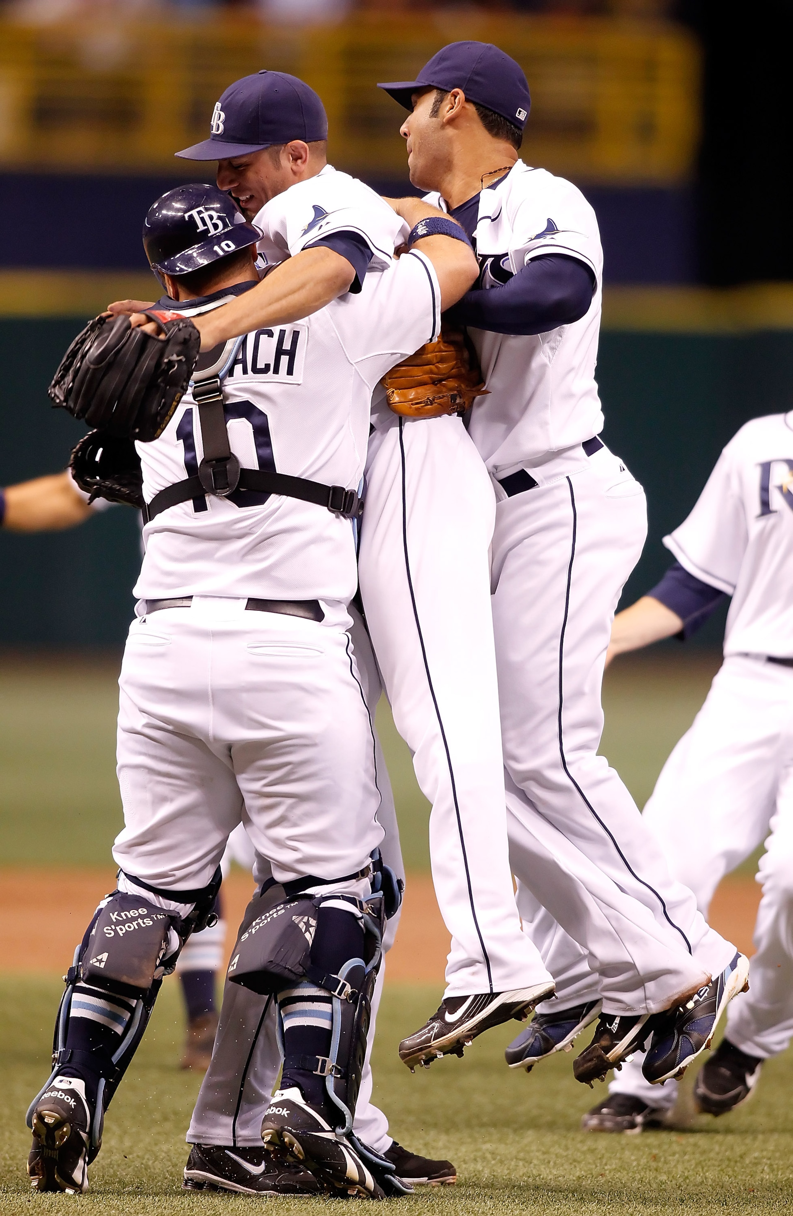 ST PETERSBURG, FL - JULY 26: Pitcher Matt Garza #22 of the Tampa Bay Rays celebrates his no hitter with teammates Kelly Shoppach #10 and Carlos Pena #23 against the Detroit Tigers during the game at Tropicana Field on July 26, 2010 in St. Petersburg, Flo ST PETERSBURG, FL - JULY 26: Pitcher Matt Garza #22 of the Tampa Bay Rays celebrates his no hitter with teammates Kelly Shoppach #10 and Carlos Pena #23 against the Detroit Tigers during the game at Tropicana Field on July 26, 2010 in St. Petersburg, Flo