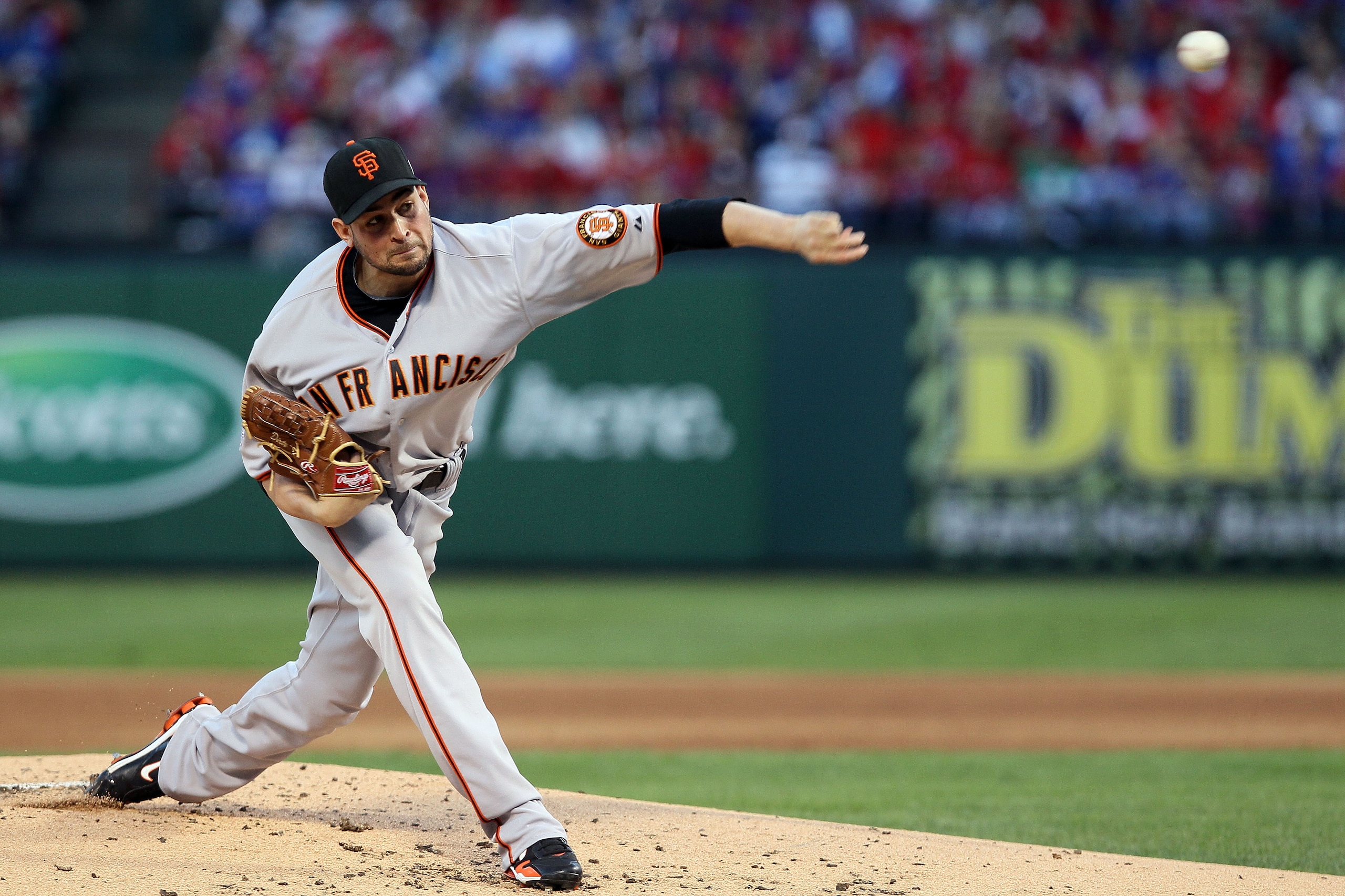 ARLINGTON, TX - OCTOBER 30: Starting pitcher Jonathan Sanchez #57 of the San Francisco Giants pitches against the Texas Rangers in Game Three of the 2010 MLB World Series at Rangers Ballpark in Arlington on October 30, 2010 in Arlington, Texas. (Photo b ARLINGTON, TX - OCTOBER 30: Starting pitcher Jonathan Sanchez #57 of the San Francisco Giants pitches against the Texas Rangers in Game Three of the 2010 MLB World Series at Rangers Ballpark in Arlington on October 30, 2010 in Arlington, Texas. (Photo b