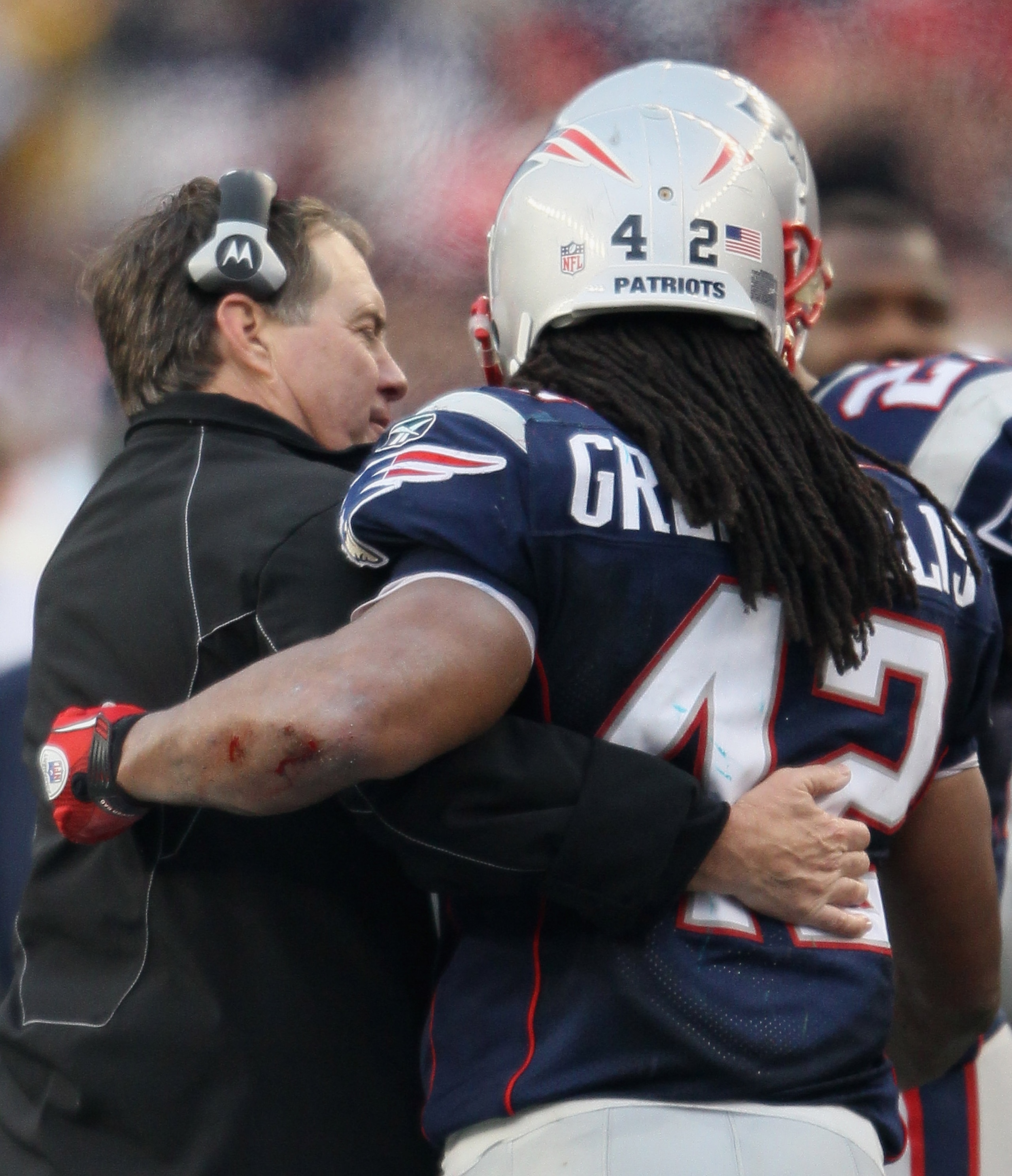 FOXBORO, MA - JANUARY 02: Head coach Bill Belichick of the New England Patriots congratulates BenJarvus Green-Ellis #42 after Green-Ellis carried for his 1000th career rushing yard in the fourth quarter against the Miami Dolphins on January 2, 2011 at Gi FOXBORO, MA - JANUARY 02: Head coach Bill Belichick of the New England Patriots congratulates BenJarvus Green-Ellis #42 after Green-Ellis carried for his 1000th career rushing yard in the fourth quarter against the Miami Dolphins on January 2, 2011 at Gi