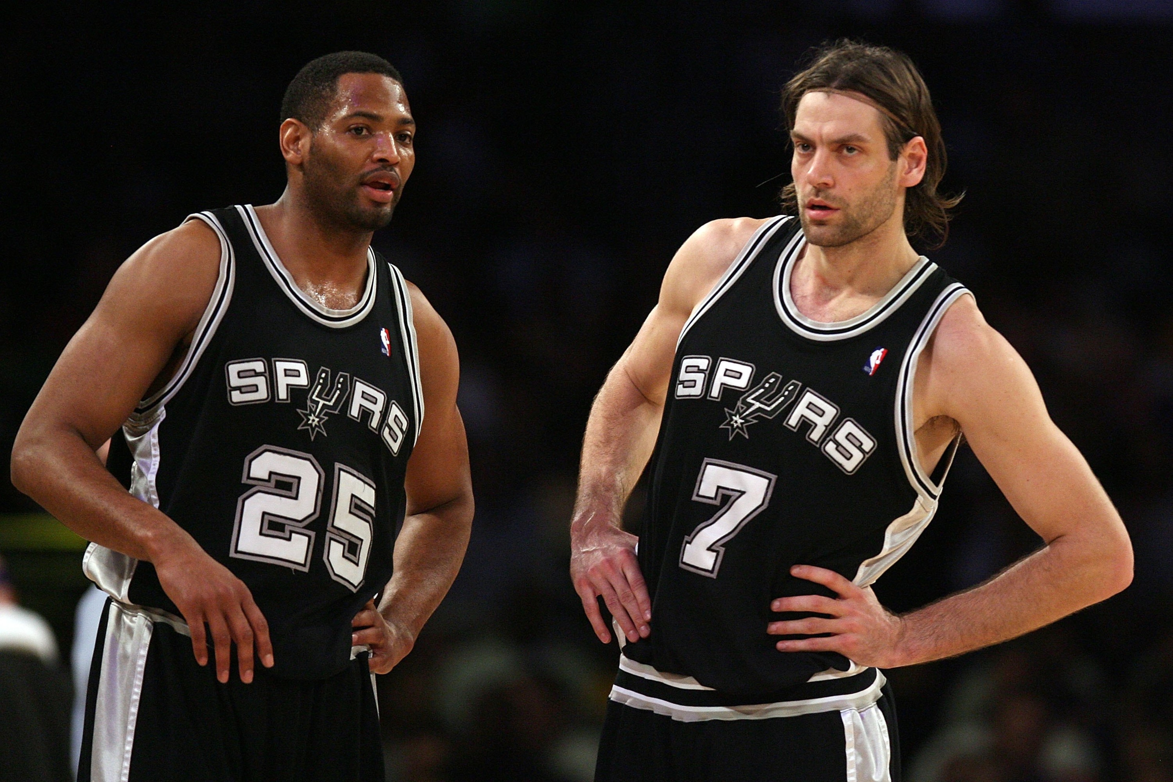 LOS ANGELES, CA - MAY 21:  Robert Horry #25 and Fabricio Oberto #7 of the San Antonio Spurs look on while taking on the Los Angeles Lakers in Game One of the Western Conference Finals during the 2008 NBA Playoffs on May 21, 2008 at Staples Center in Los A