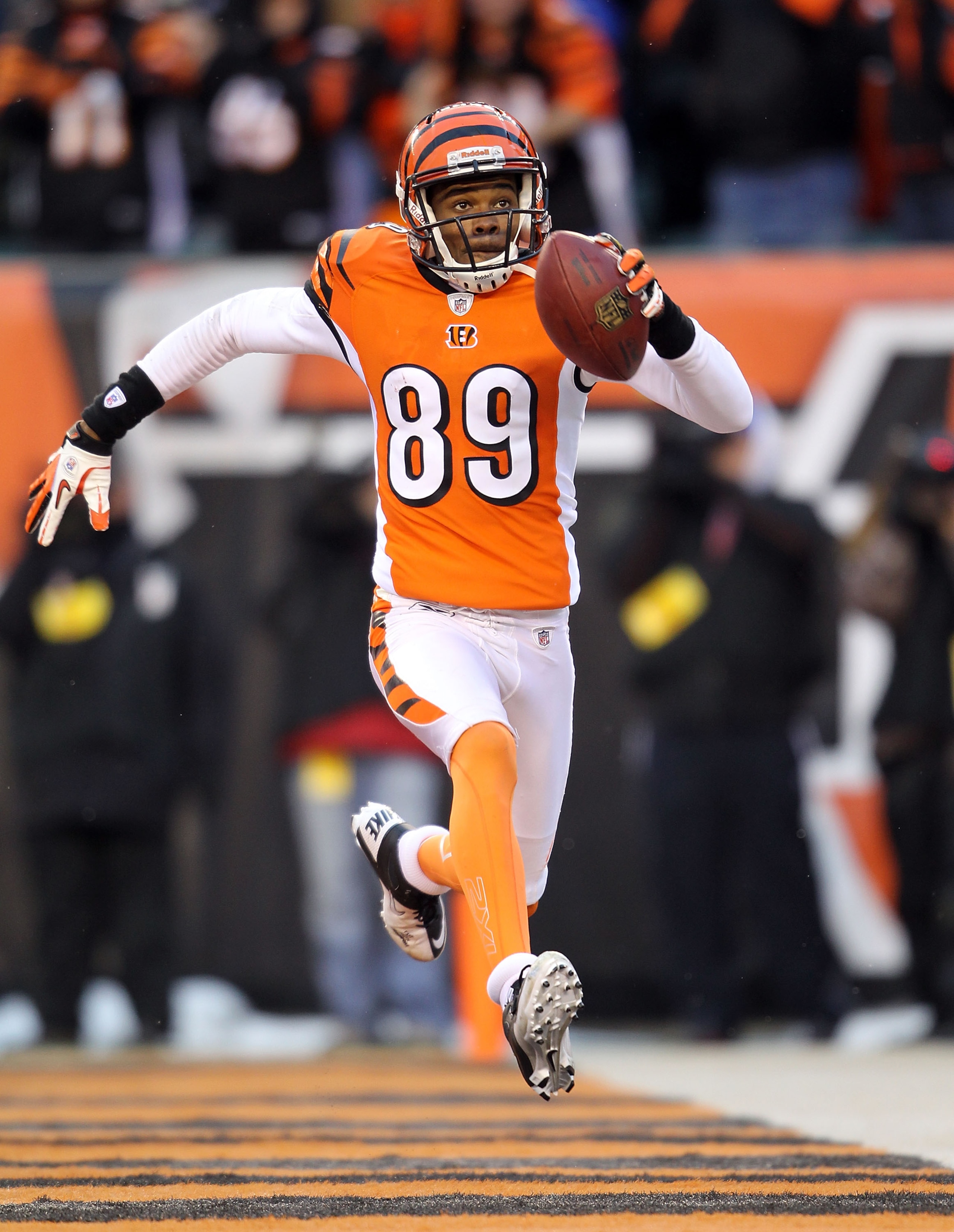 CINCINNATI - DECEMBER 26: Jerome Simpson #89 of the Cincinnati Bengals celebrates after catching a touchdown pass during the NFL game against the San Diego Chargers at Paul Brown Stadium on December 26, 2010 in Cincinnati, Ohio. The Bengals 34-20. (Phot CINCINNATI - DECEMBER 26: Jerome Simpson #89 of the Cincinnati Bengals celebrates after catching a touchdown pass during the NFL game against the San Diego Chargers at Paul Brown Stadium on December 26, 2010 in Cincinnati, Ohio. The Bengals 34-20. (Phot