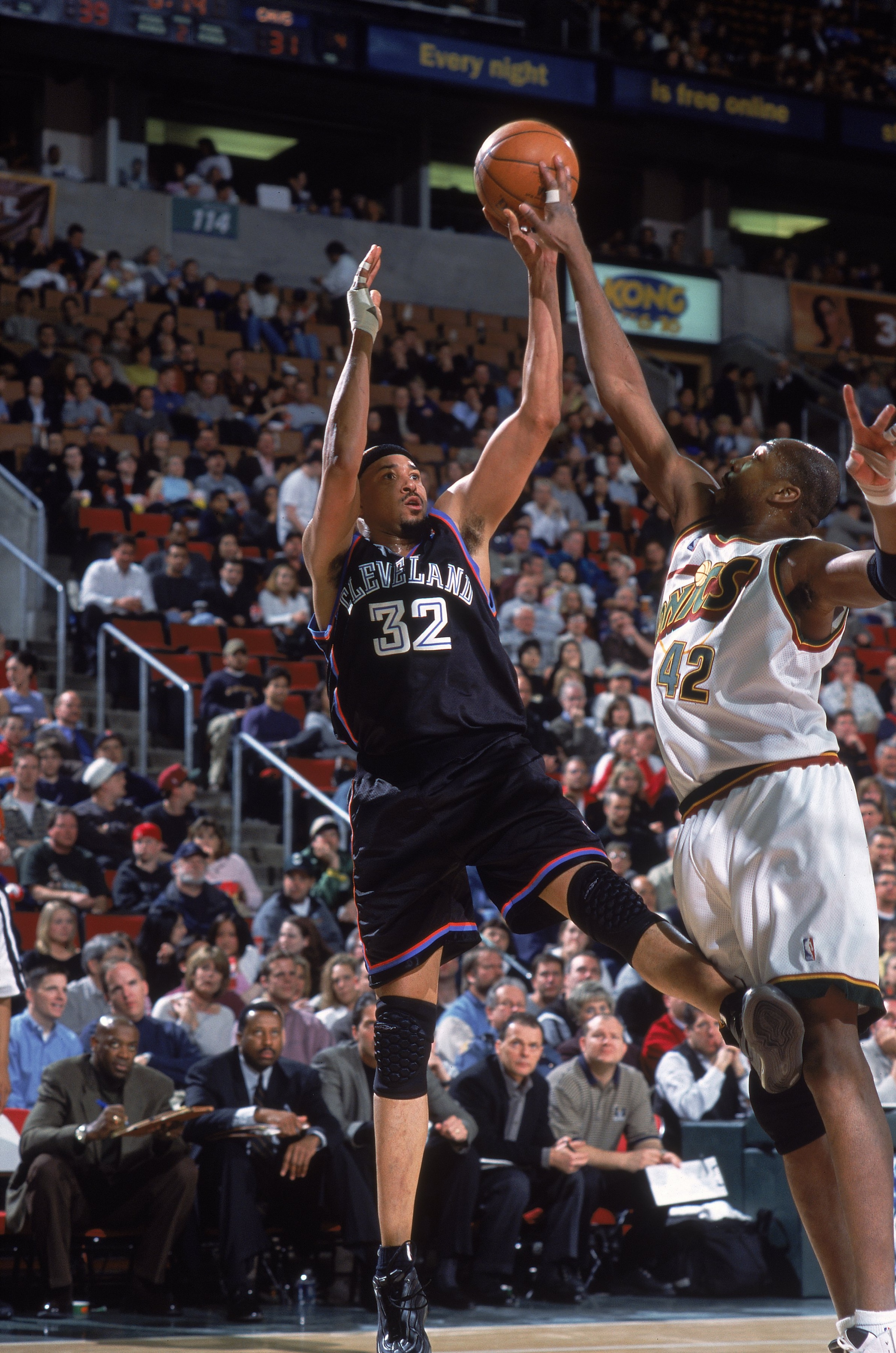 26 Mar 2001:  Chris Gatling #32 of the Cleveland Cavalires gets ready to shoot the ball as Vin Baker #42 of the Seattle SuperSonics tries to block him during the game at Key Arena in Seattle, Washington. The SuperSonics defeated the Cavaliers 104-86.    N