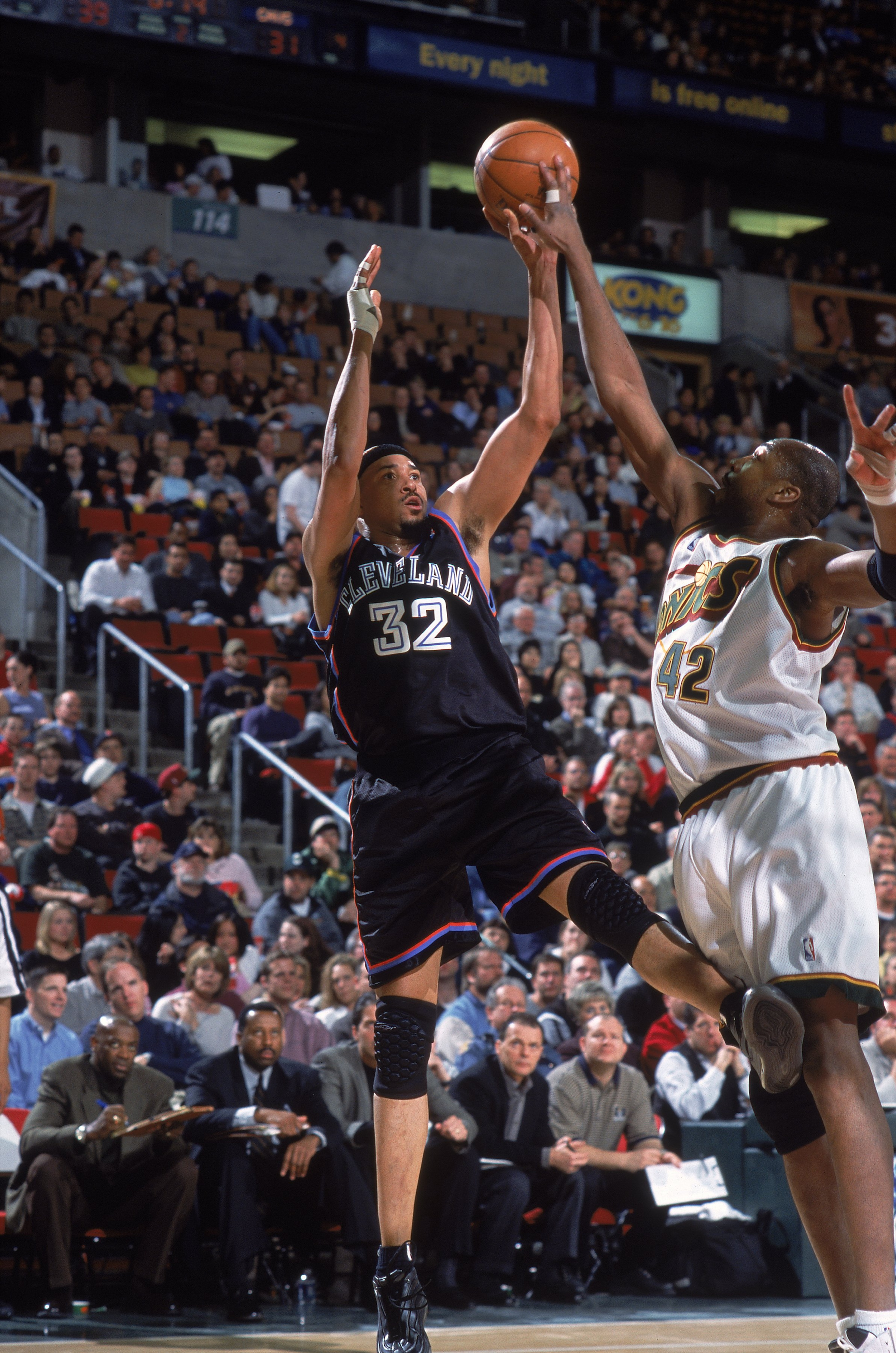 26 Mar 2001:  Chris Gatling #32 of the Cleveland Cavalires gets ready to shoot the ball as Vin Baker #42 of the Seattle SuperSonics tries to block him during the game at Key Arena in Seattle, Washington. The SuperSonics defeated the Cavaliers 104-86.    N