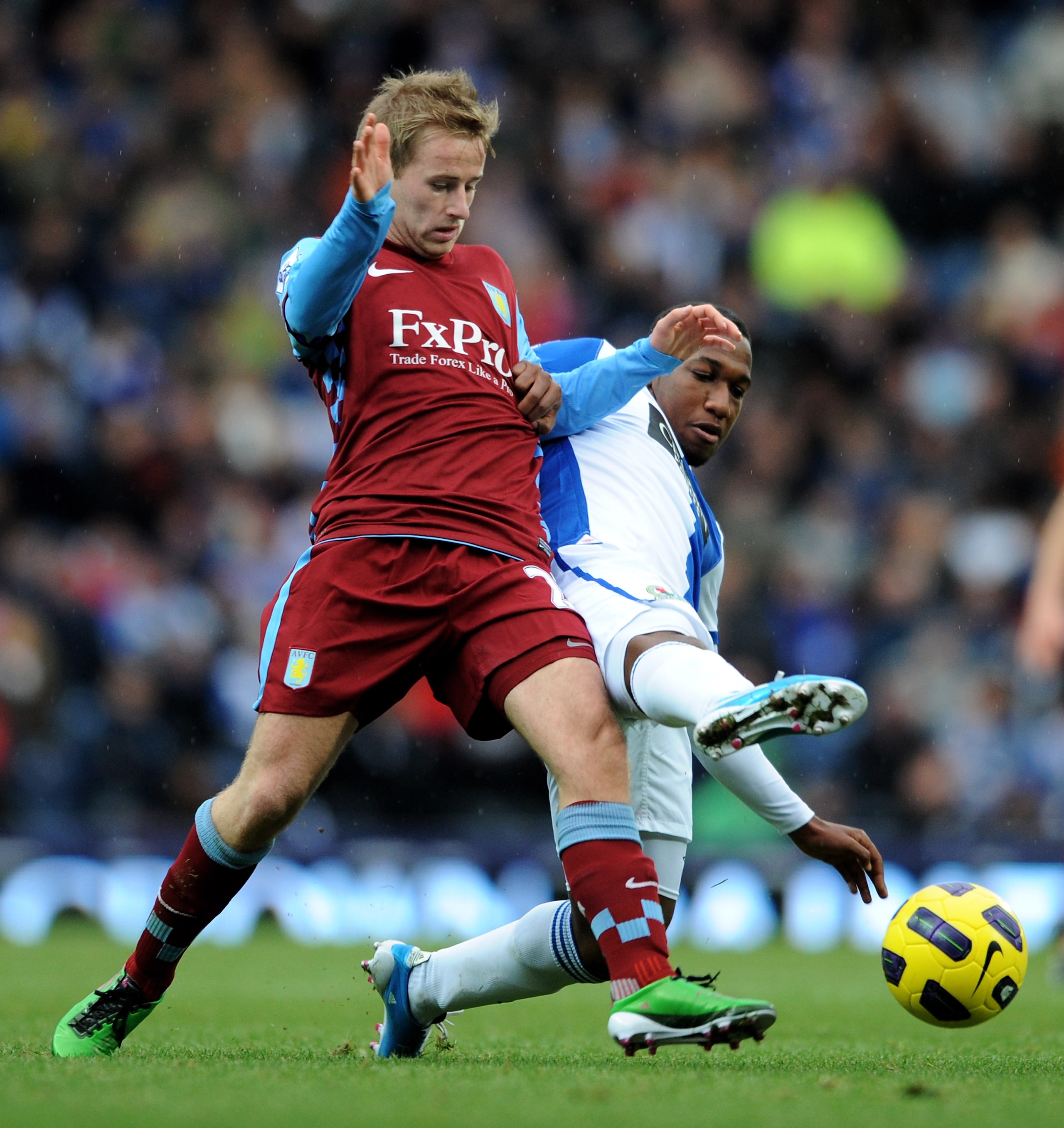 BLACKBURN, ENGLAND - NOVEMBER 21:  Barry Bannan of Aston Villa battles for the ball with Junior Hoilett of Blackburn Rovers during the Barclays Premier League match between Blackburn Rovers and Aston Villa at Ewood Park on November 21, 2010 in Blackburn,
