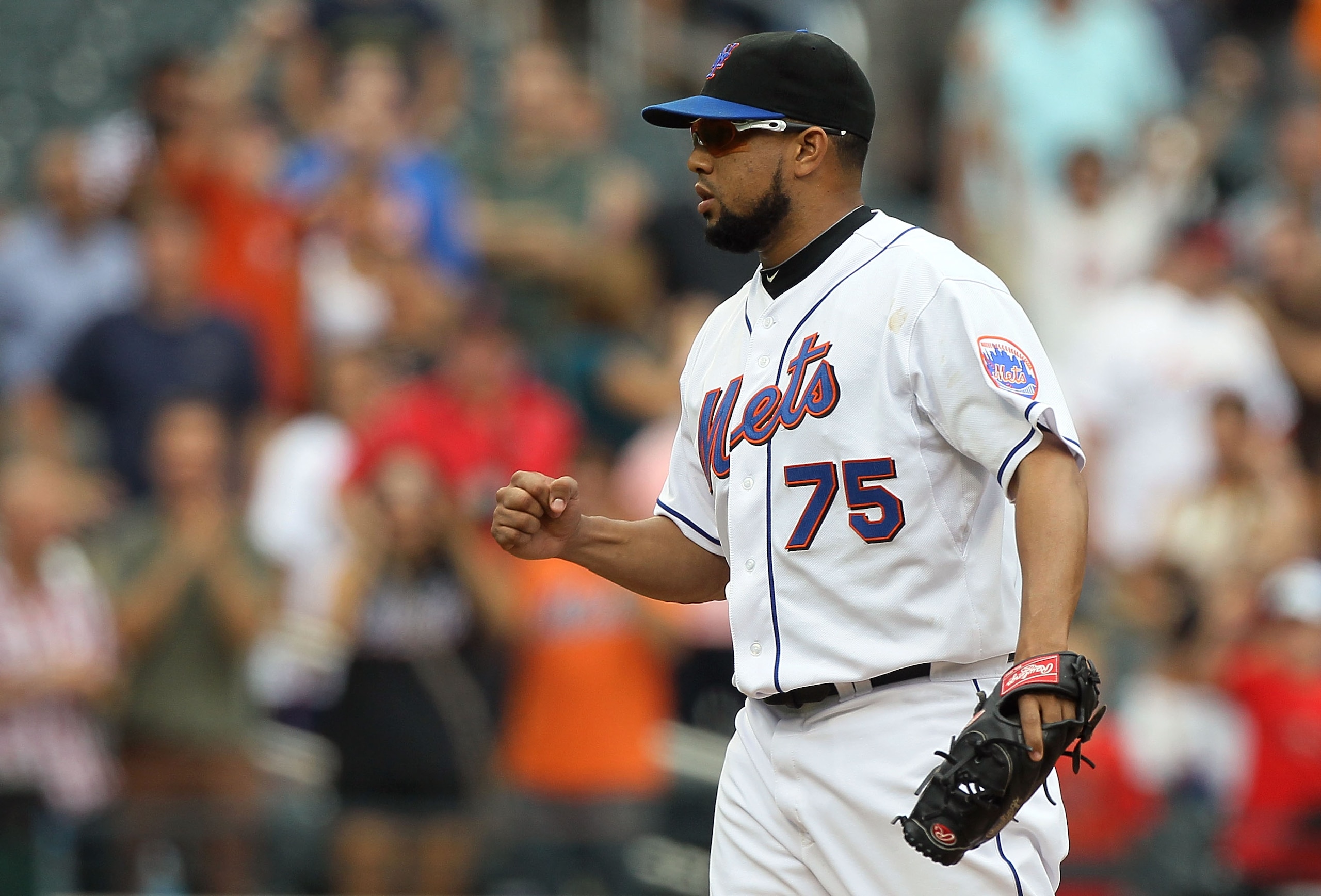 NEW YORK - JULY 29: Francisco Rodriguez #75 of the New York Mets celebrates after defeating the St. Louis Cardinals on July 29, 2010 at Citi Field in the Flushing neighborhood of the Queens borough of New York City. The Mets defeated the Cardinals 4-0. NEW YORK - JULY 29: Francisco Rodriguez #75 of the New York Mets celebrates after defeating the St. Louis Cardinals on July 29, 2010 at Citi Field in the Flushing neighborhood of the Queens borough of New York City. The Mets defeated the Cardinals 4-0.