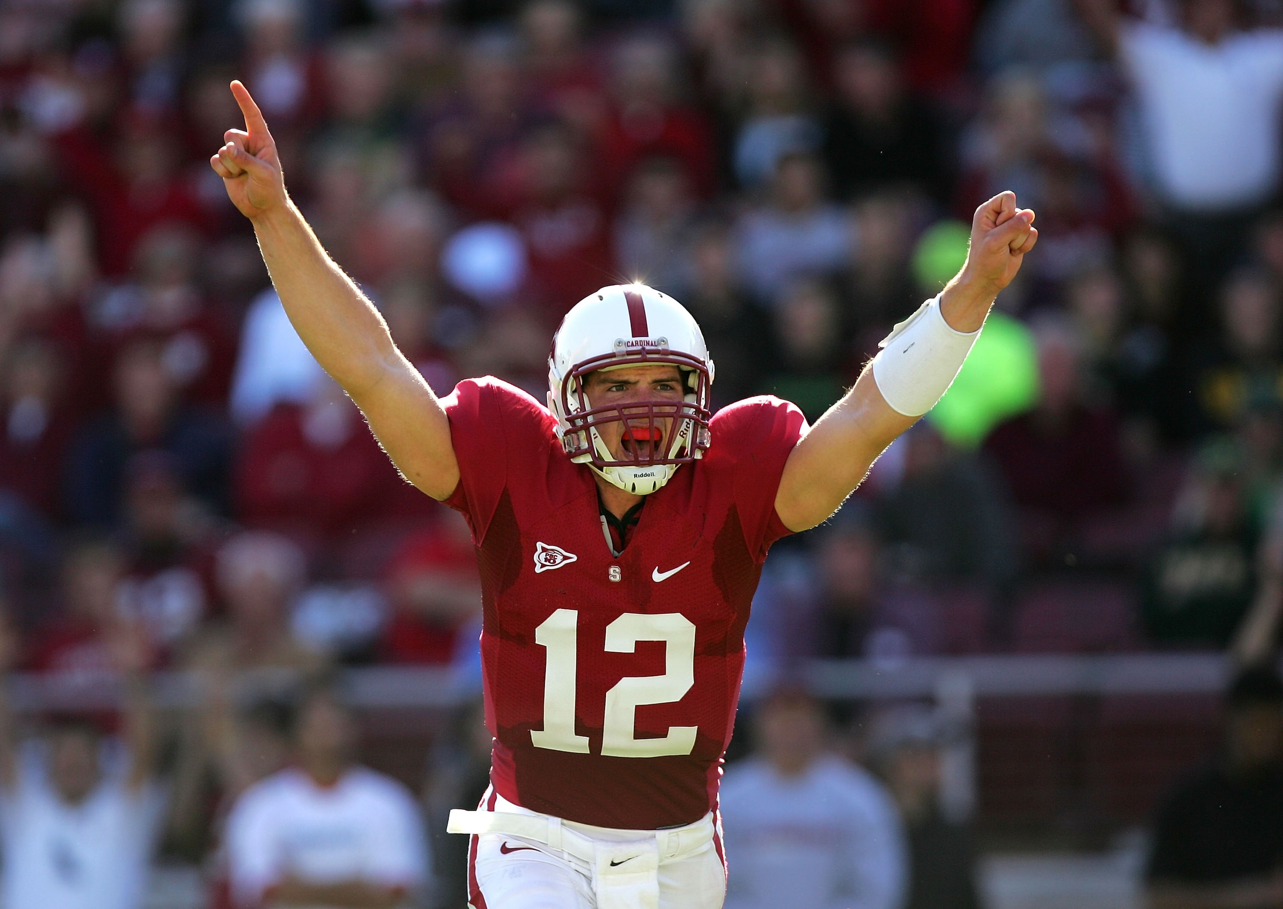 PALO ALTO, CA - NOVEMBER 07: Andrew Luck #12 of the Stanford Cardinal celebrates after the Cardinal scored a touchdown to go up 30-14 over the Oregon Ducks at Stanford Stadium on November 7, 2009 in Palo Alto, California. (Photo by Ezra Shaw/Getty Image PALO ALTO, CA - NOVEMBER 07: Andrew Luck #12 of the Stanford Cardinal celebrates after the Cardinal scored a touchdown to go up 30-14 over the Oregon Ducks at Stanford Stadium on November 7, 2009 in Palo Alto, California. (Photo by Ezra Shaw/Getty Image