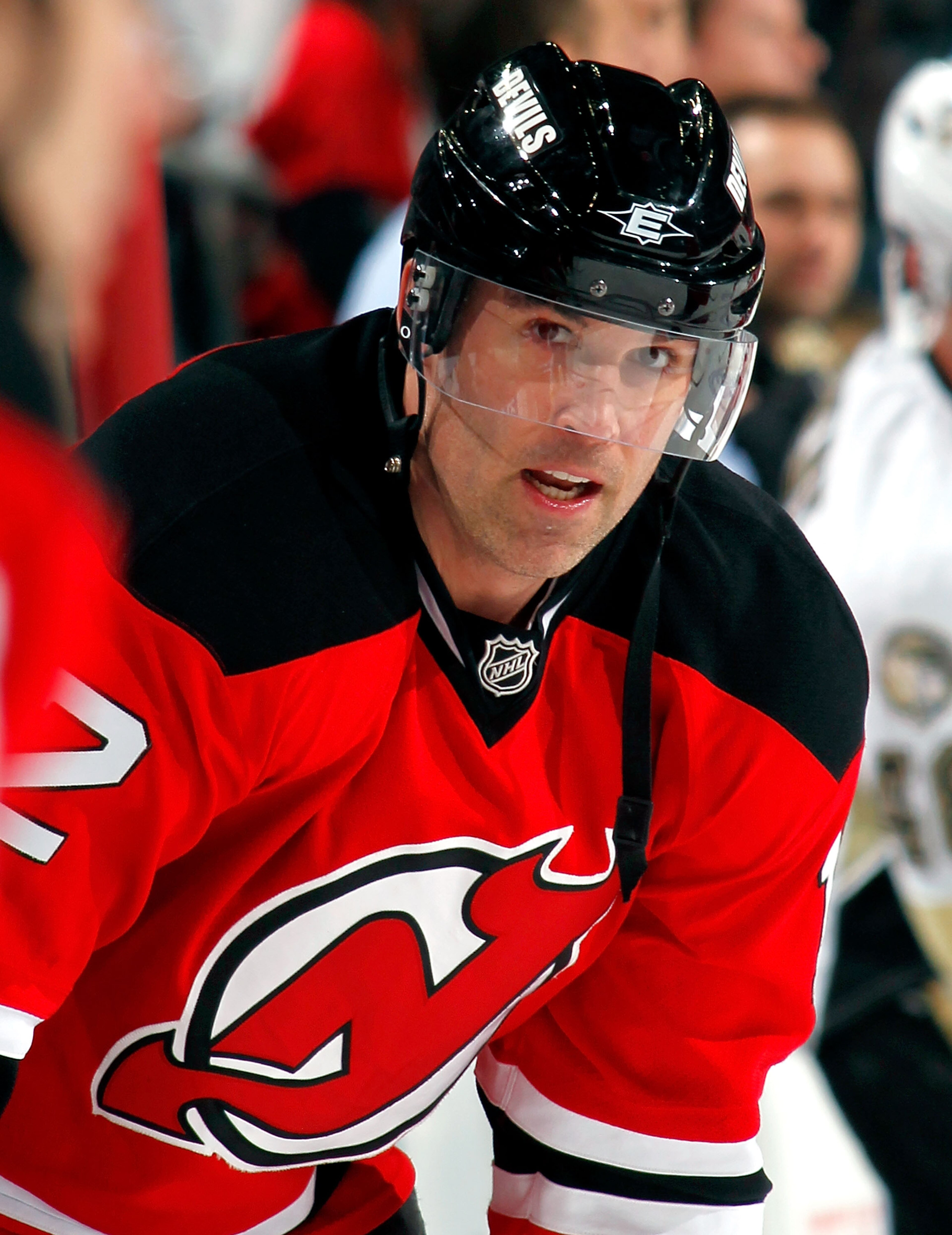 NEWARK, NJ - JANUARY 20:  Brian Rolston #12 of the New Jersey Devils takes a break during warmups before an NHL hockey game against the Pittsburgh Penguins at the Prudential Center on January 20, 2011 in Newark, New Jersey.  (Photo by Paul Bereswill/Getty