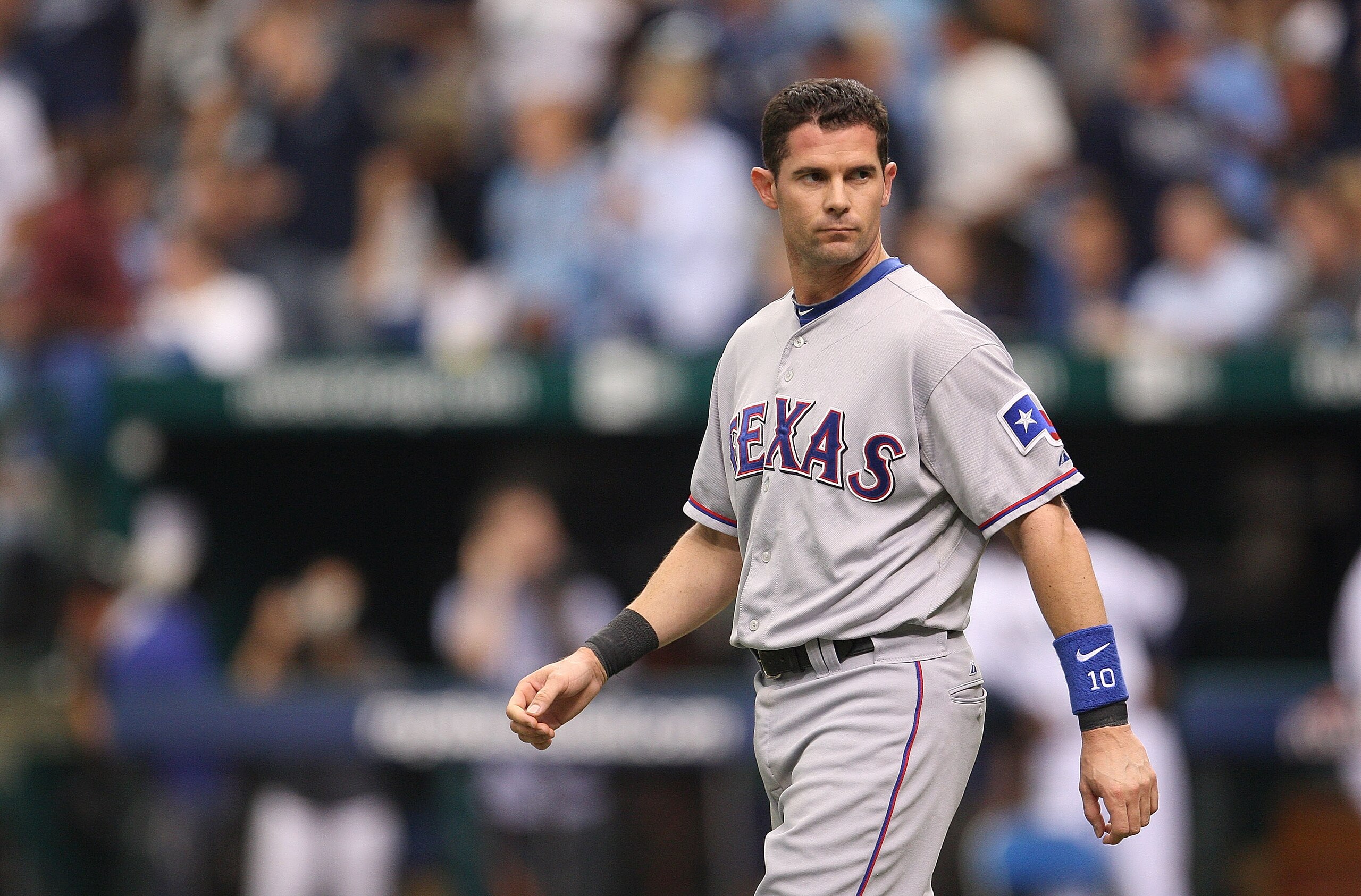 ST PETERSBURG, FL - OCTOBER 06: 6: Michael Young #10 of the Texas Rangers walks onto the field after striking out during Game 1 of the ALDS against the Tampa Bay Rays at Tropicana Field on October 6, 2010 in St. Petersburg, Florida. (Photo by Mike Ehrma ST PETERSBURG, FL - OCTOBER 06: 6: Michael Young #10 of the Texas Rangers walks onto the field after striking out during Game 1 of the ALDS against the Tampa Bay Rays at Tropicana Field on October 6, 2010 in St. Petersburg, Florida. (Photo by Mike Ehrma