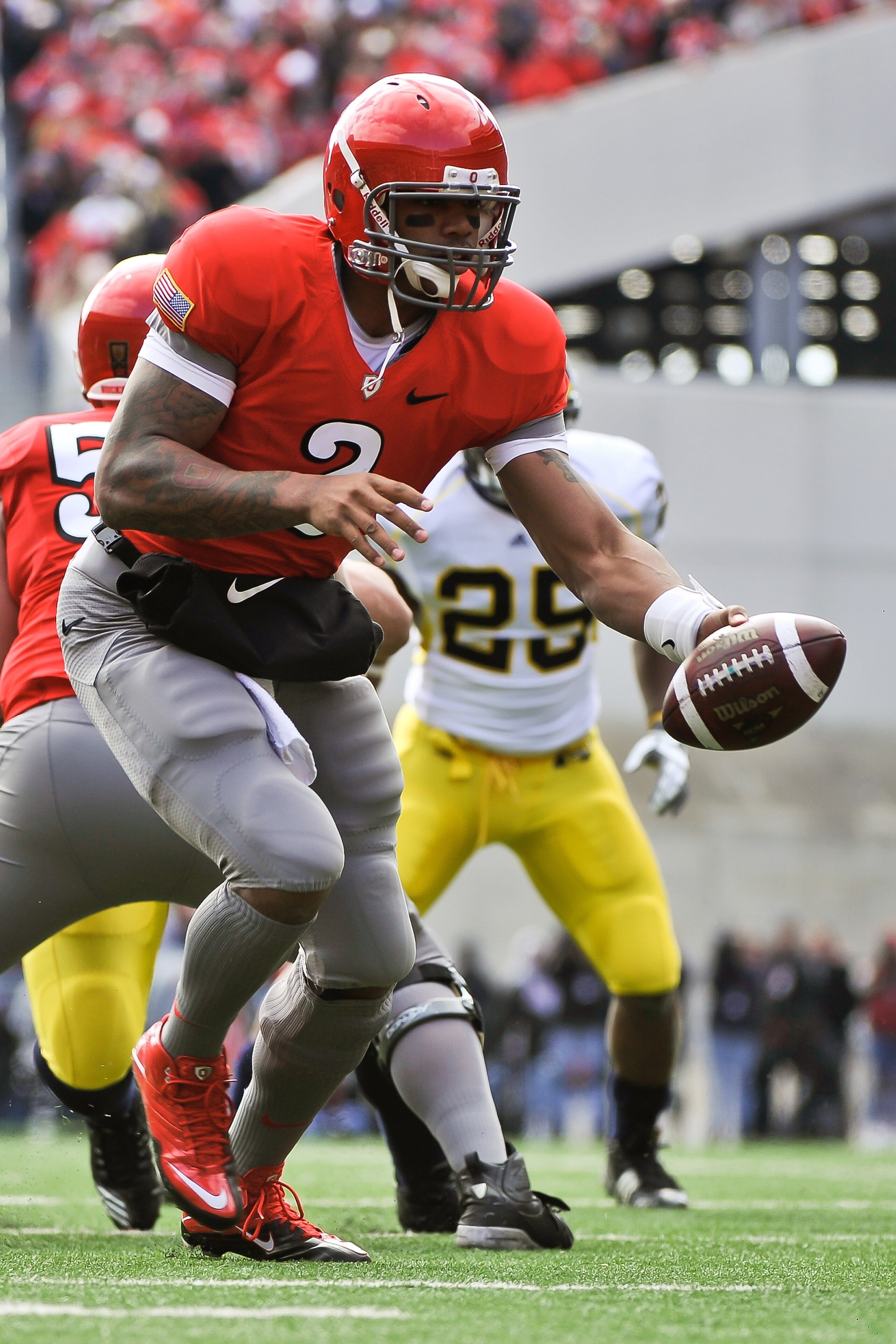COLUMBUS, OH - NOVEMBER 27: Quarterback Terrelle Pryor #2 of the Ohio State Buckeyes hands off against the Michigan Wolverines at Ohio Stadium on November 27, 2010 in Columbus, Ohio. (Photo by Jamie Sabau/Getty Images) COLUMBUS, OH - NOVEMBER 27: Quarterback Terrelle Pryor #2 of the Ohio State Buckeyes hands off against the Michigan Wolverines at Ohio Stadium on November 27, 2010 in Columbus, Ohio. (Photo by Jamie Sabau/Getty Images)