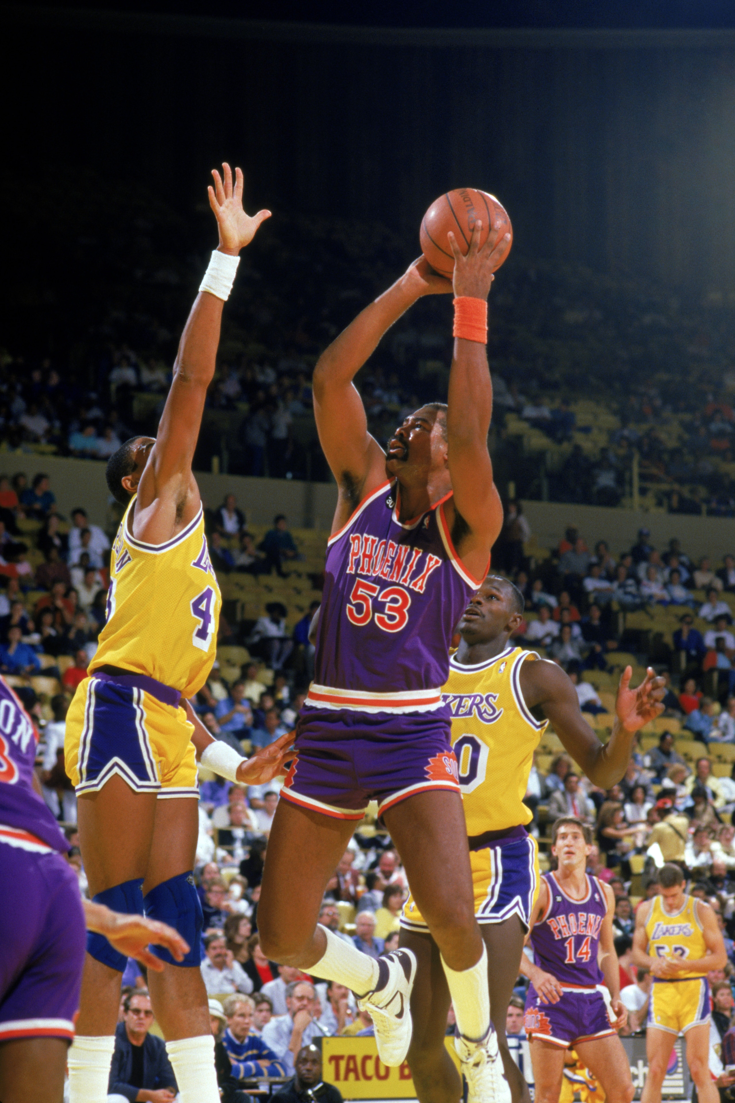 INGLEWOOD, CA - 1988:  James Edwards #53 of the Phoenix Suns shoots against the Los Angeles Lakers during the game at the Great Western Forum in Inglewood, California.  (Photo by Rick Stewart/Getty Images)