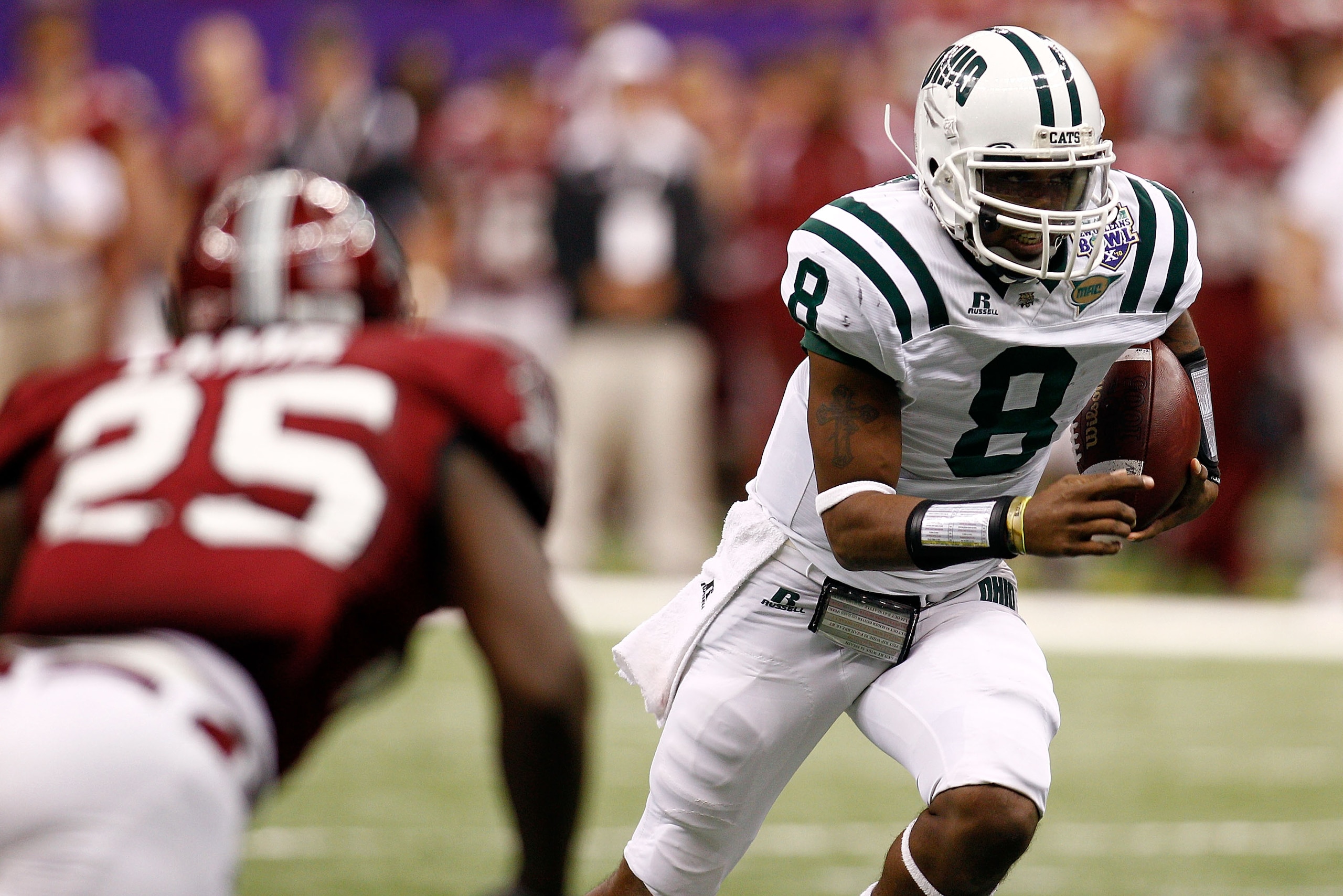 NEW ORLEANS, LA - DECEMBER 18: Quarterback Boo Jackson #8 of the Ohio University Bobcats runs with the ball during the game against the Troy University Trojans during the R&L Carriers New Orleans Bowl at the Louisiana Superdome on December 18, 2010 in N NEW ORLEANS, LA - DECEMBER 18: Quarterback Boo Jackson #8 of the Ohio University Bobcats runs with the ball during the game against the Troy University Trojans during the R&L Carriers New Orleans Bowl at the Louisiana Superdome on December 18, 2010 in N