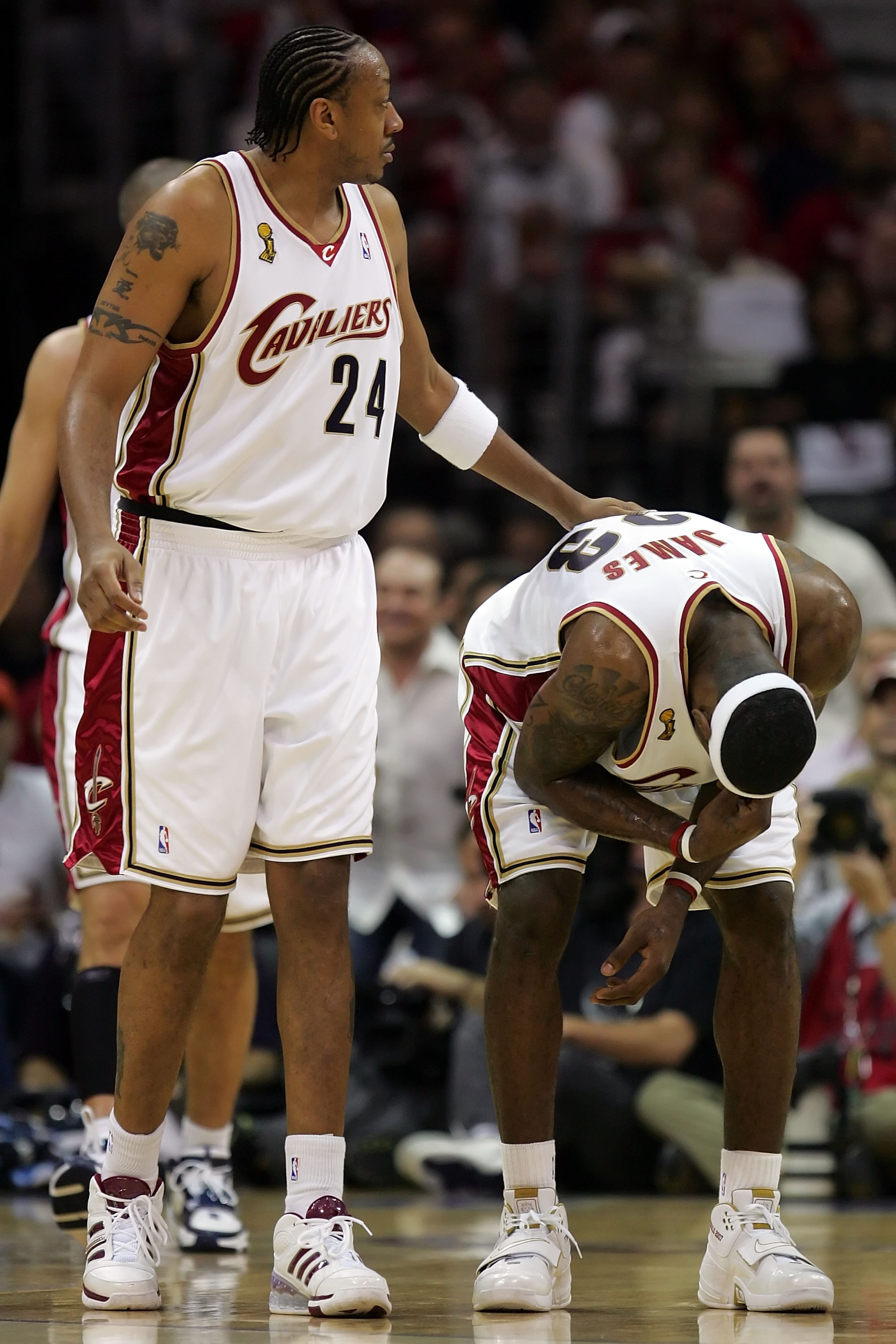 CLEVELAND - JUNE 14: Donyell Marshall #24 checks on LeBron James #23 of the Clevelan Cavaliers as he bends down and covers his face after being hit in Game Four of the NBA Finals against the San Antonio Spurs on June 14, 2007 at the Quicken Loans Arena in