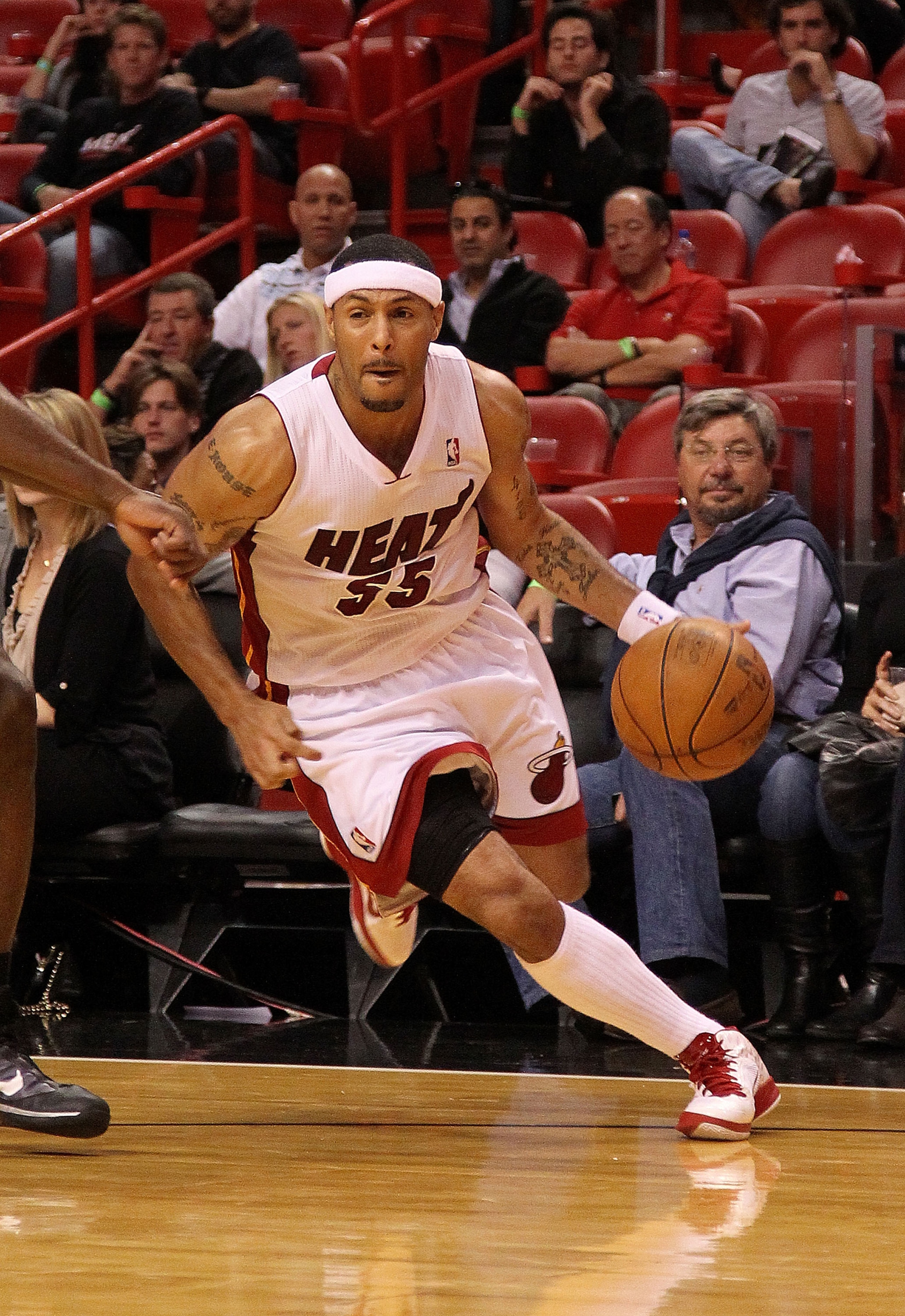 MIAMI, FL - JANUARY 31: Eddie House #55 of the Miami Heat dribbles during a game against the Cleveland Cavaliers at American Airlines Arena on January 31, 2011 in Miami, Florida. NOTE TO USER: User expressly acknowledges and agrees that, by downloading an
