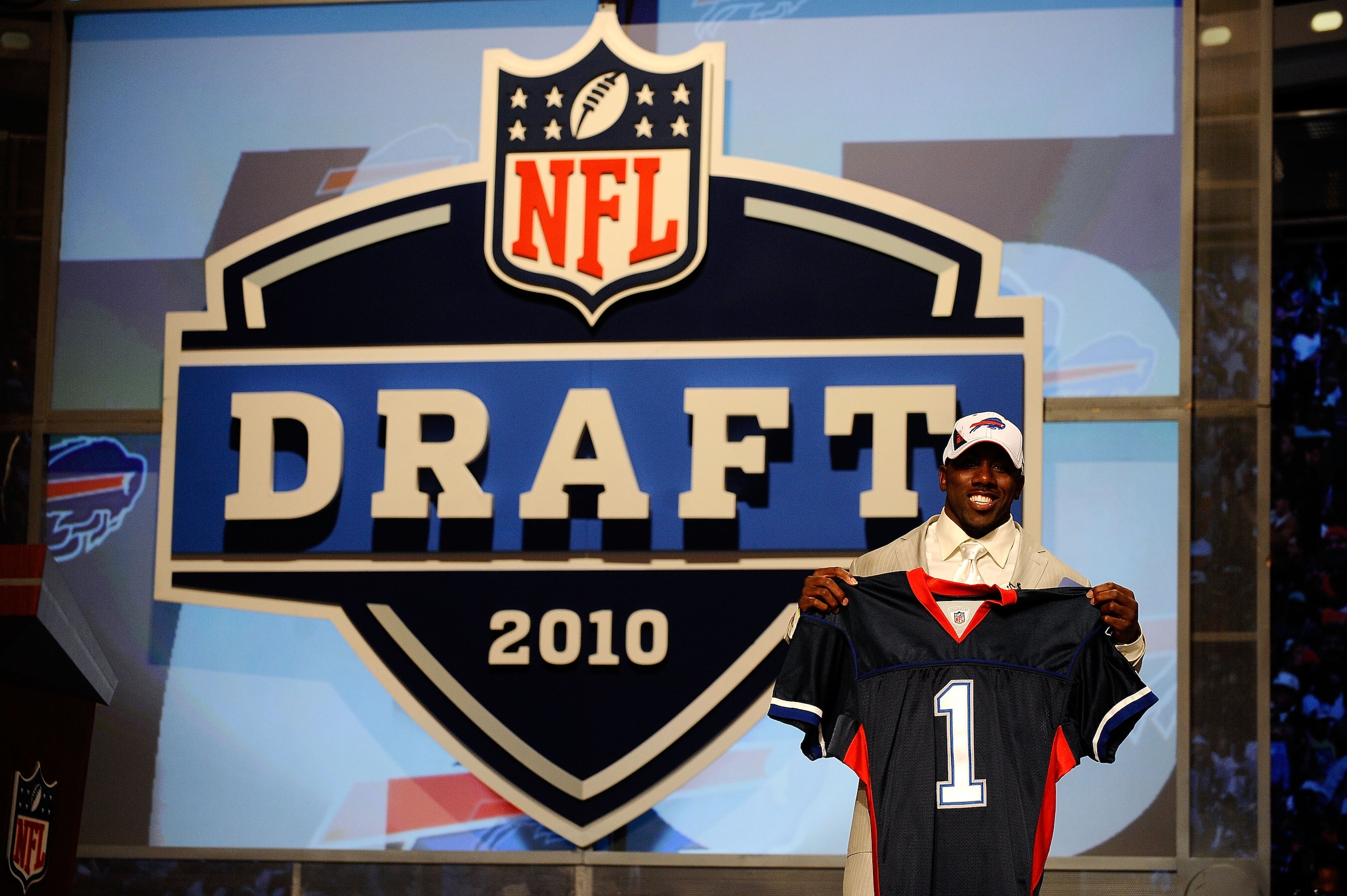 NEW YORK - APRIL 22:  C.J. Spiller from the Clemson Tigers holds up a Buffalo Bills jersey after he was selected #9 overall by the Bills during the first round of the 2010 NFL Draft at Radio City Music Hall on April 22, 2010 in New York City.  (Photo by J