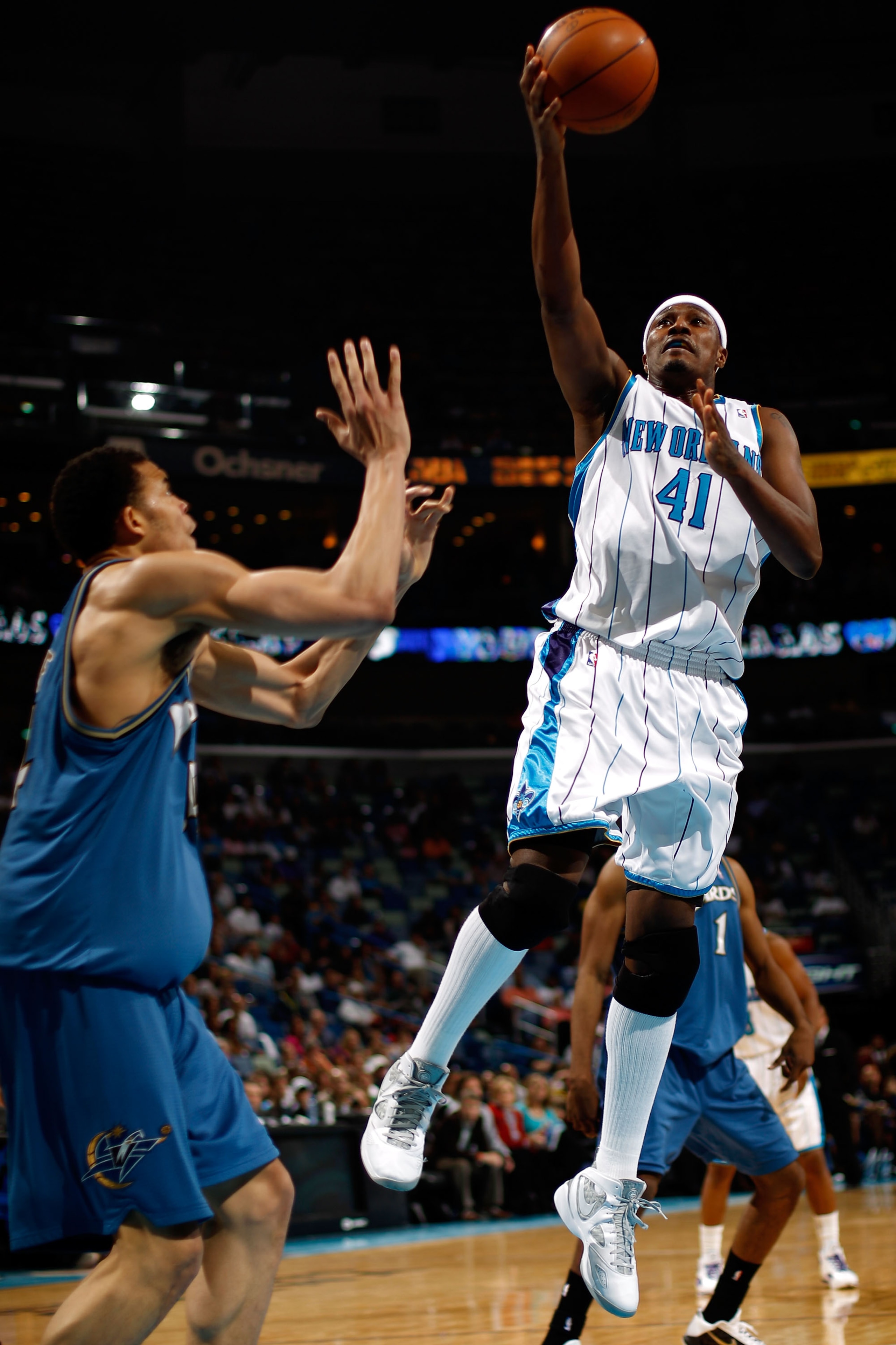 NEW ORLEANS - MARCH 31:  James Posey #41 of the New Orleans Hornets shoots the ball over JaVale McGee #34 of the Washington Wizards at New Orleans Arena on March 31, 2010 in New Orleans, Louisiana.  The Wizards defeated the Hornets 96-91.  NOTE TO USER: U