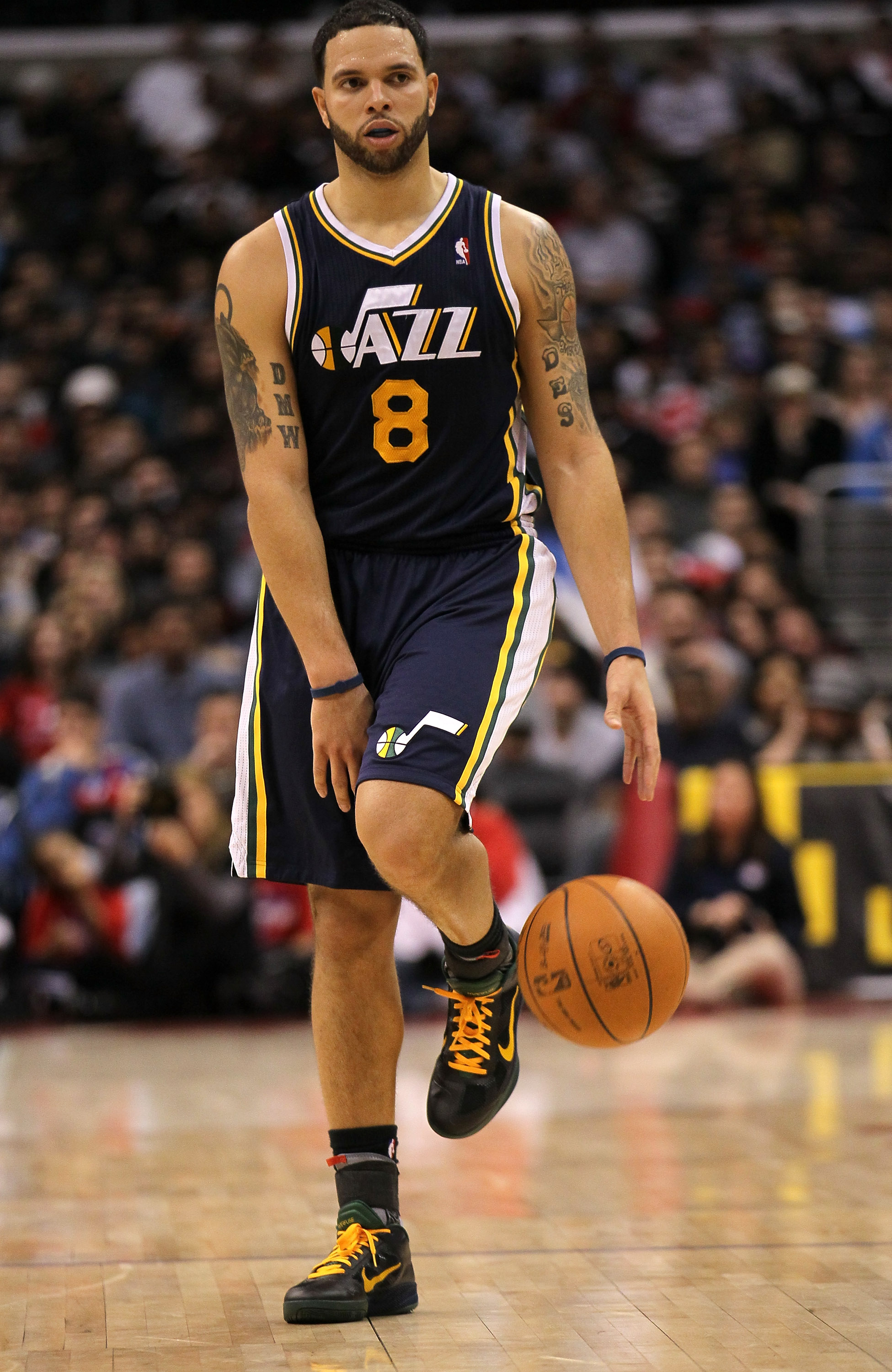 LOS ANGELES, CA - DECEMBER 29:  Deron Williams #8 of the Utah Jazz controls the ball against the Los Angeles Clippers at Staples Center on December 29, 2010 in Los Angeles, California.   The Jazz won 103-85.  NOTE TO USER: User expressly acknowledges and 