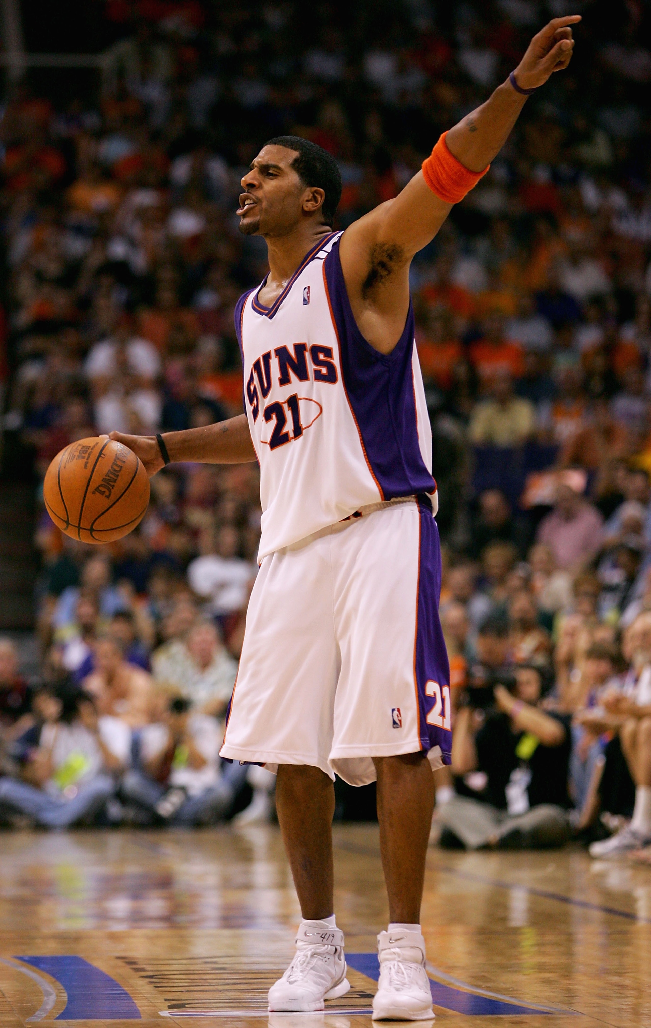 PHOENIX - MAY 22:  Jim Jackson #21 of the Phoenix Suns calls a play against the San Antonio Spurs in Game one of the Western Conference Finals during the 2005 NBA Playoffs at America West Arena on May 22, 2005 in Phoenix, Arizona.  The Spurs won 121-114.